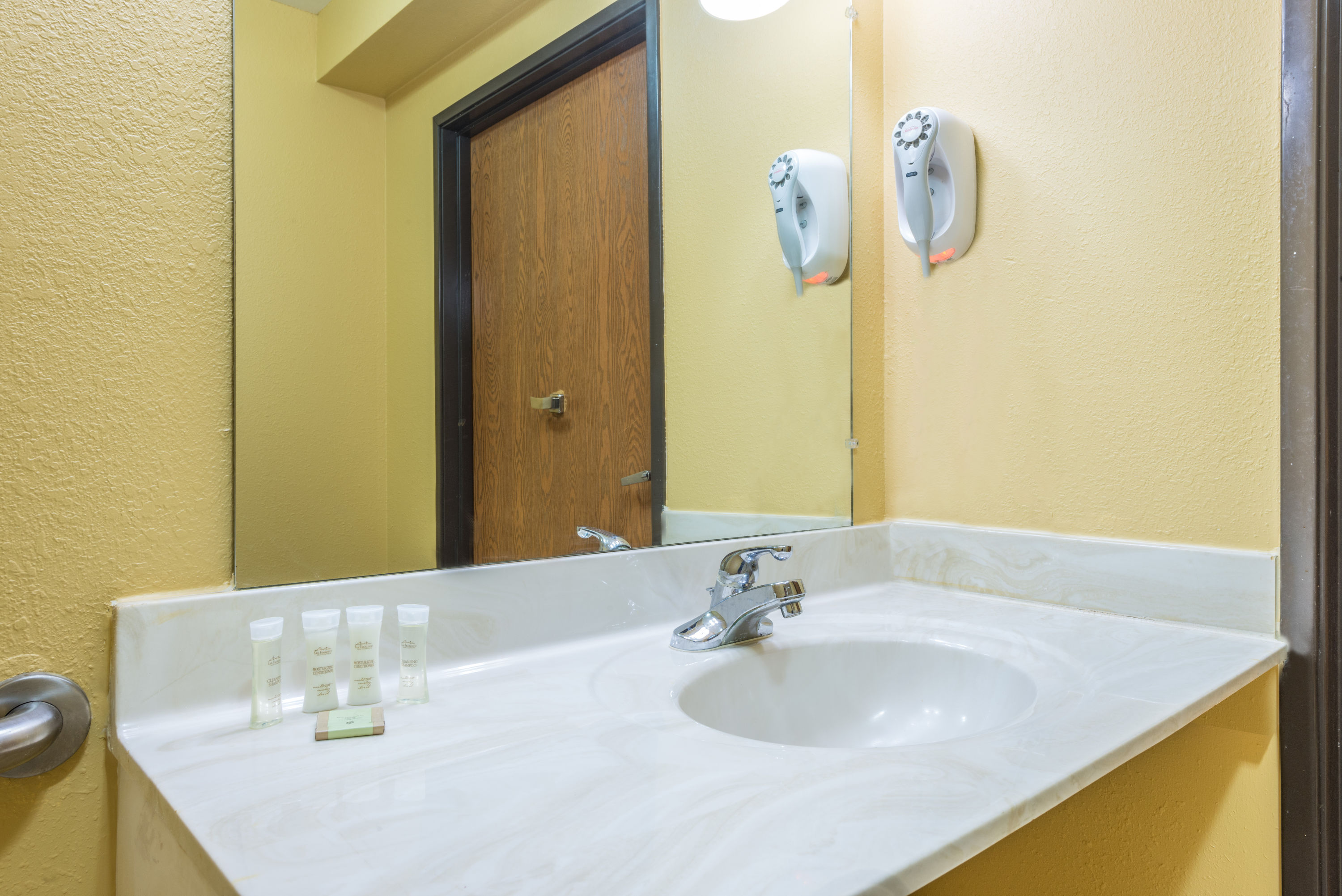 Guest room at the Super 8 by Wyndham Troy IL/St. Louis Area in Troy, Illinois