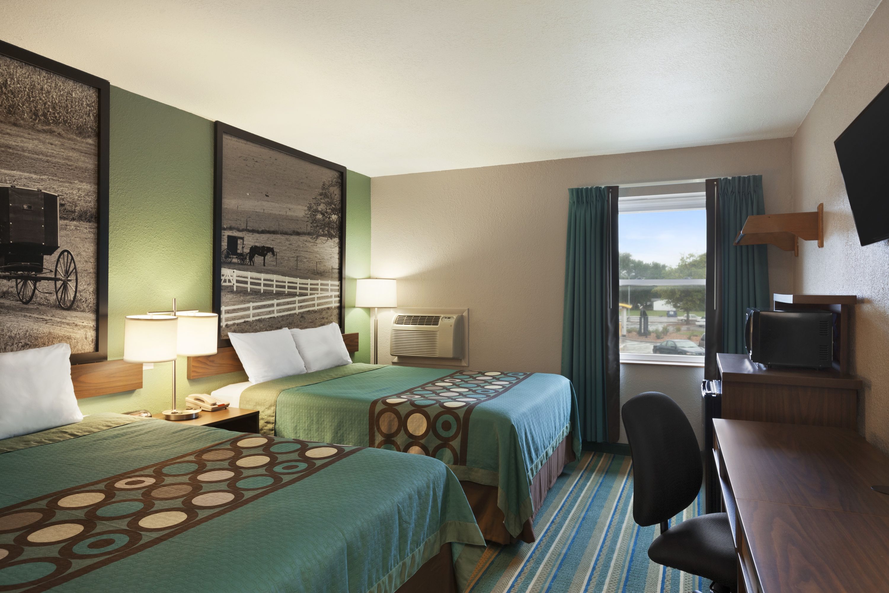 Guest room at the Super 8 by Wyndham Tuscola in Tuscola, Illinois