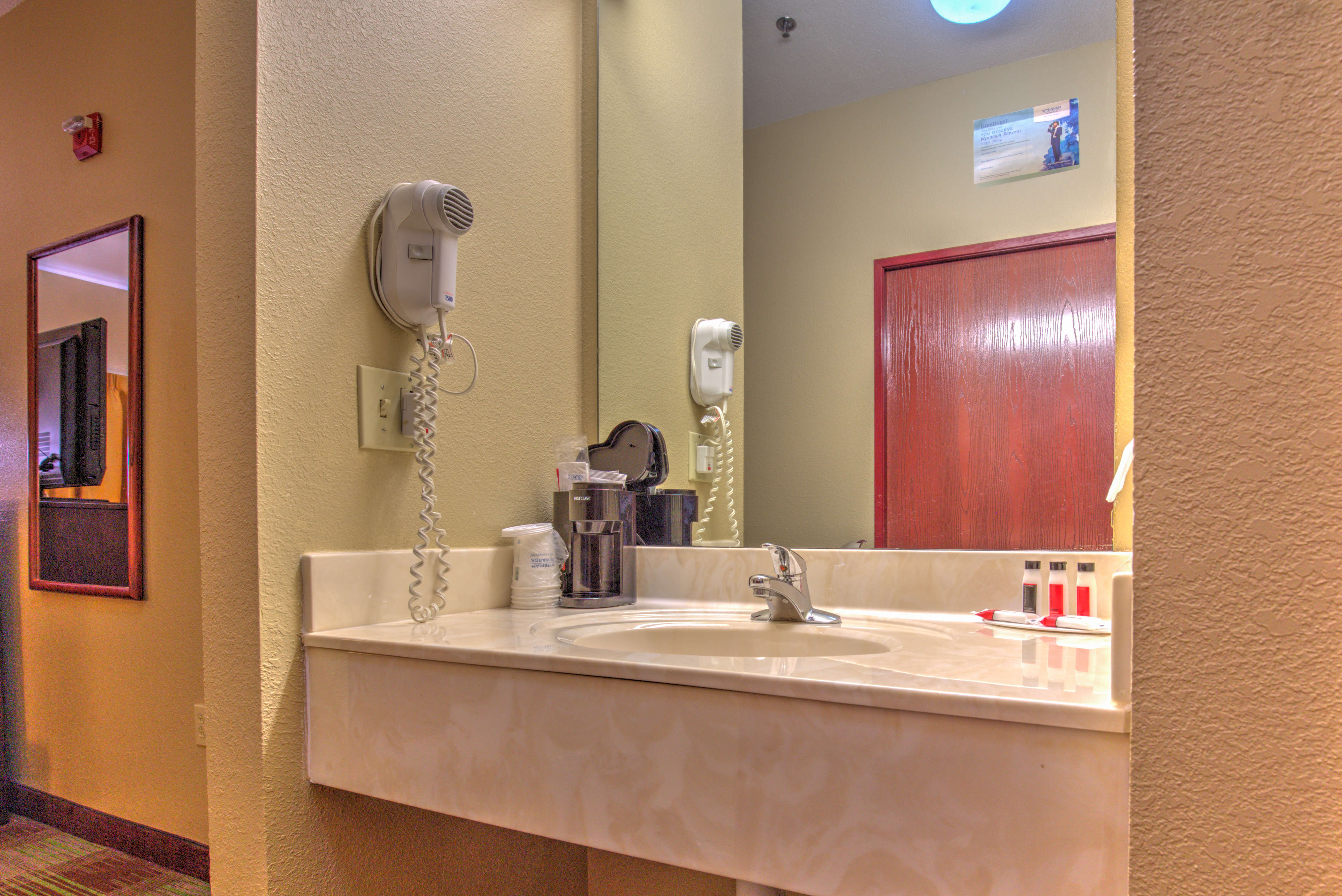 Guest room bath at the Super 8 by Wyndham Waterloo in Waterloo, Illinois