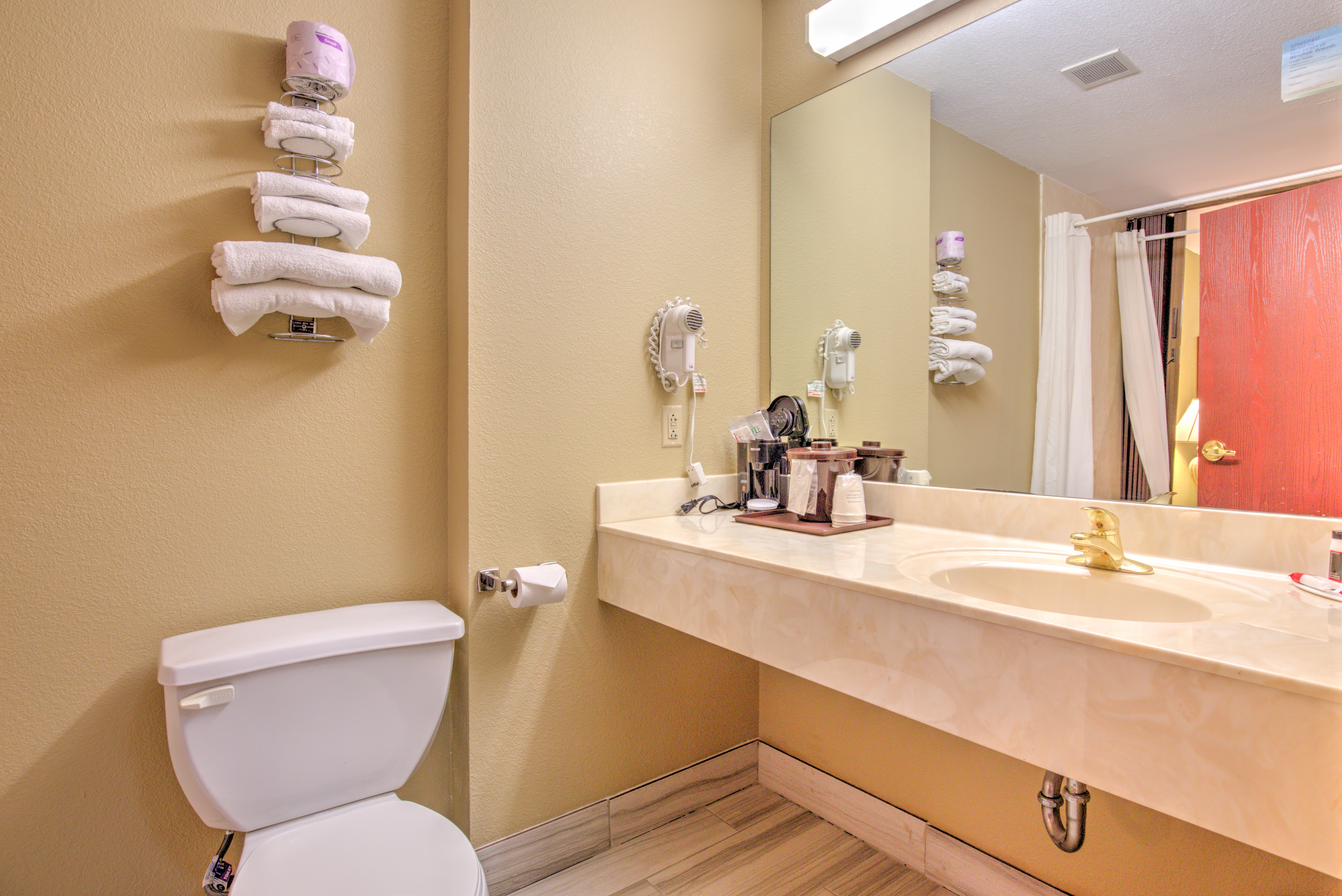 Guest room bath at the Super 8 by Wyndham Waterloo in Waterloo, Illinois
