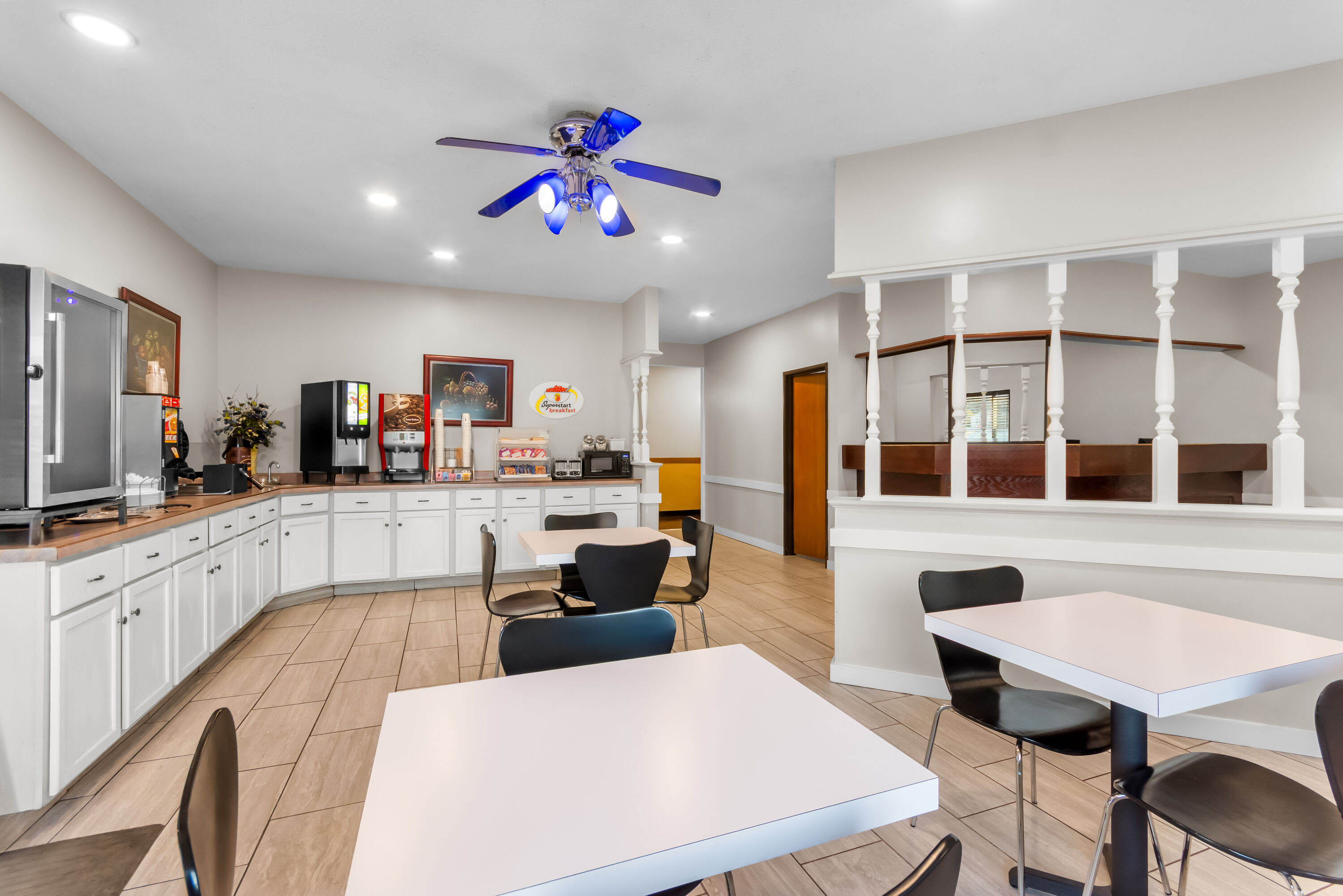 Super 8 by Wyndham Bloomington University Area restaurant breakfast area with seating in Bloomington, Indiana