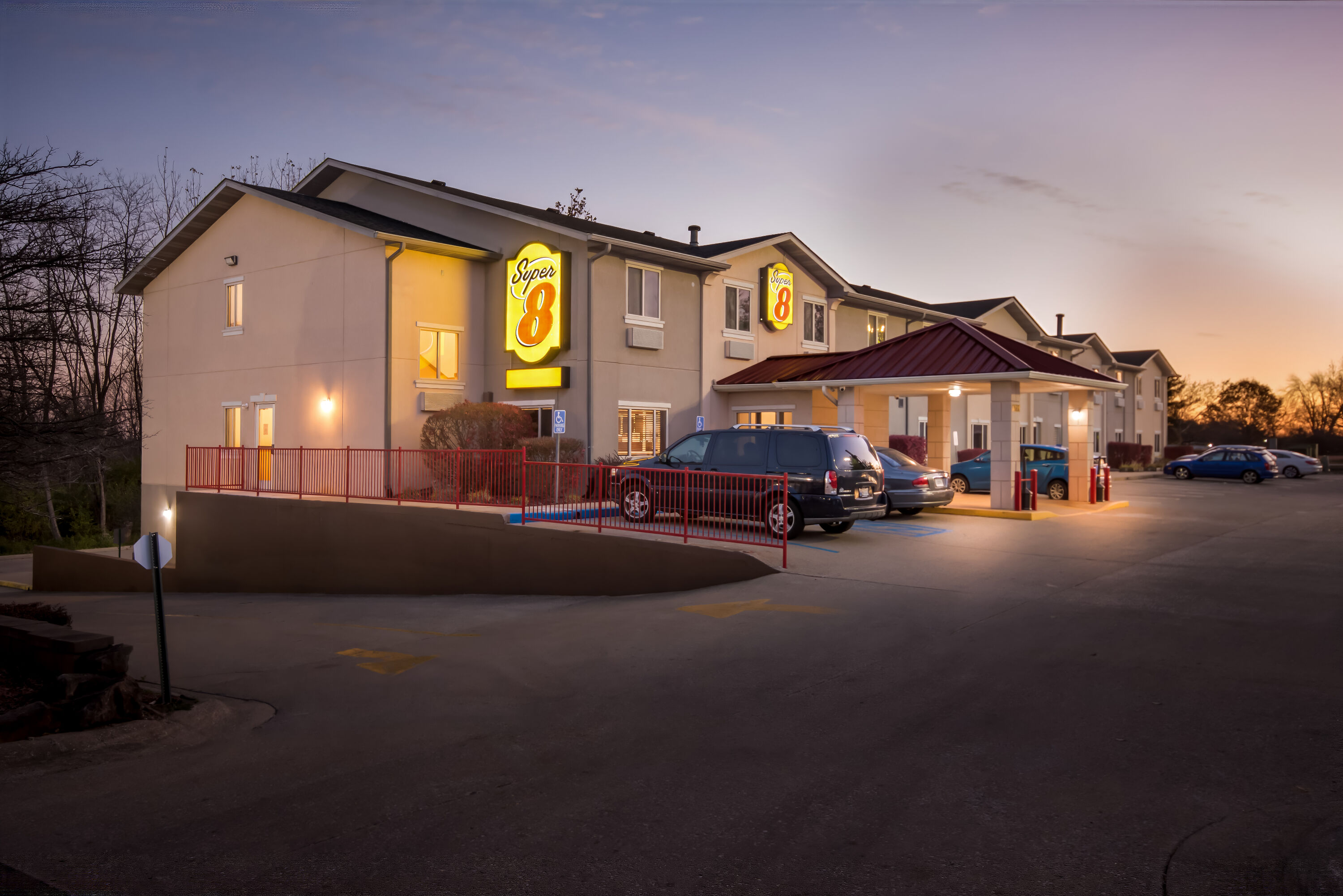 Exterior Night Image of Super 8 by Wyndham Bloomington University Area hotel in Bloomington, Indiana
