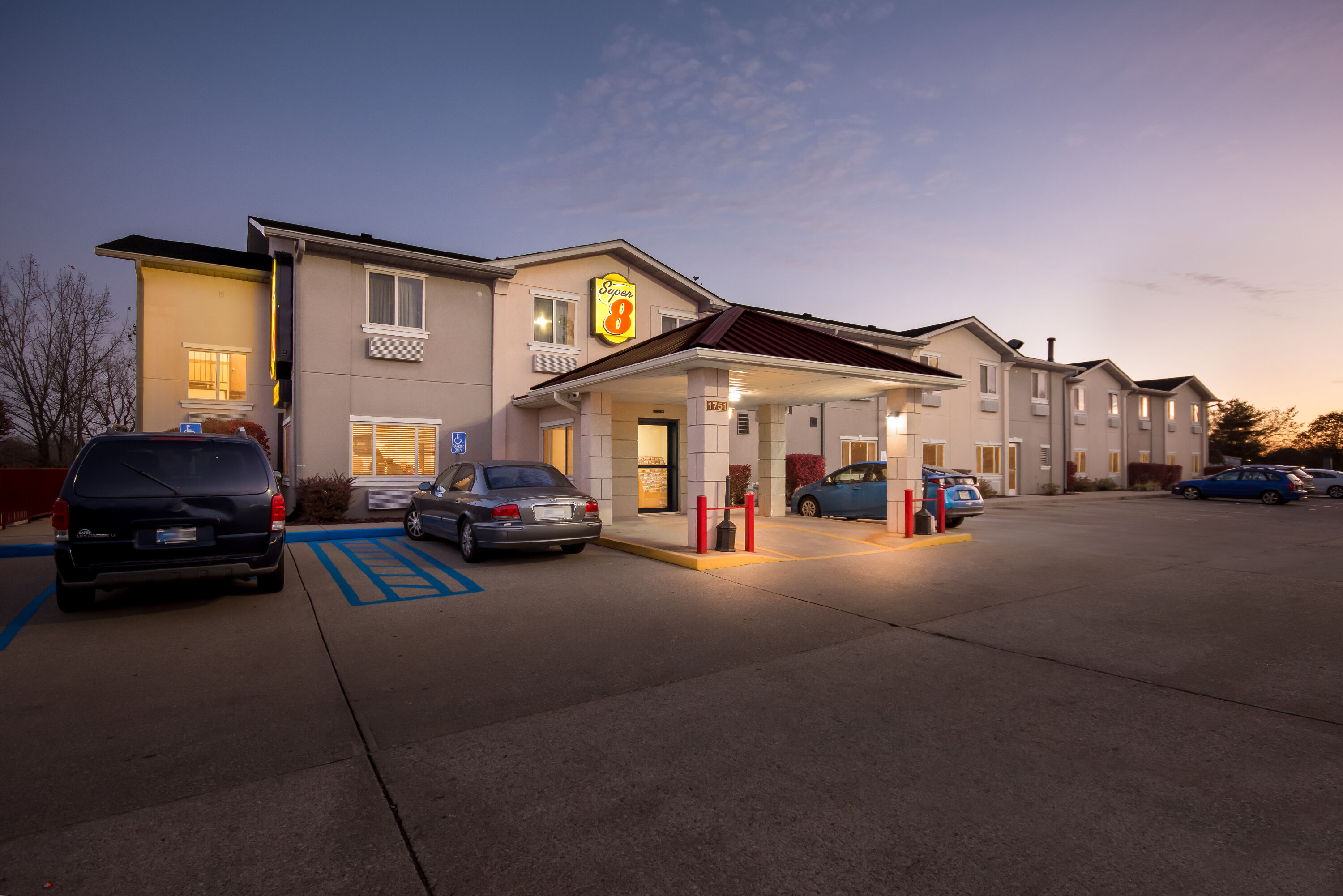 Exterior Night Image of Super 8 by Wyndham Bloomington University Area hotel in Bloomington, Indiana