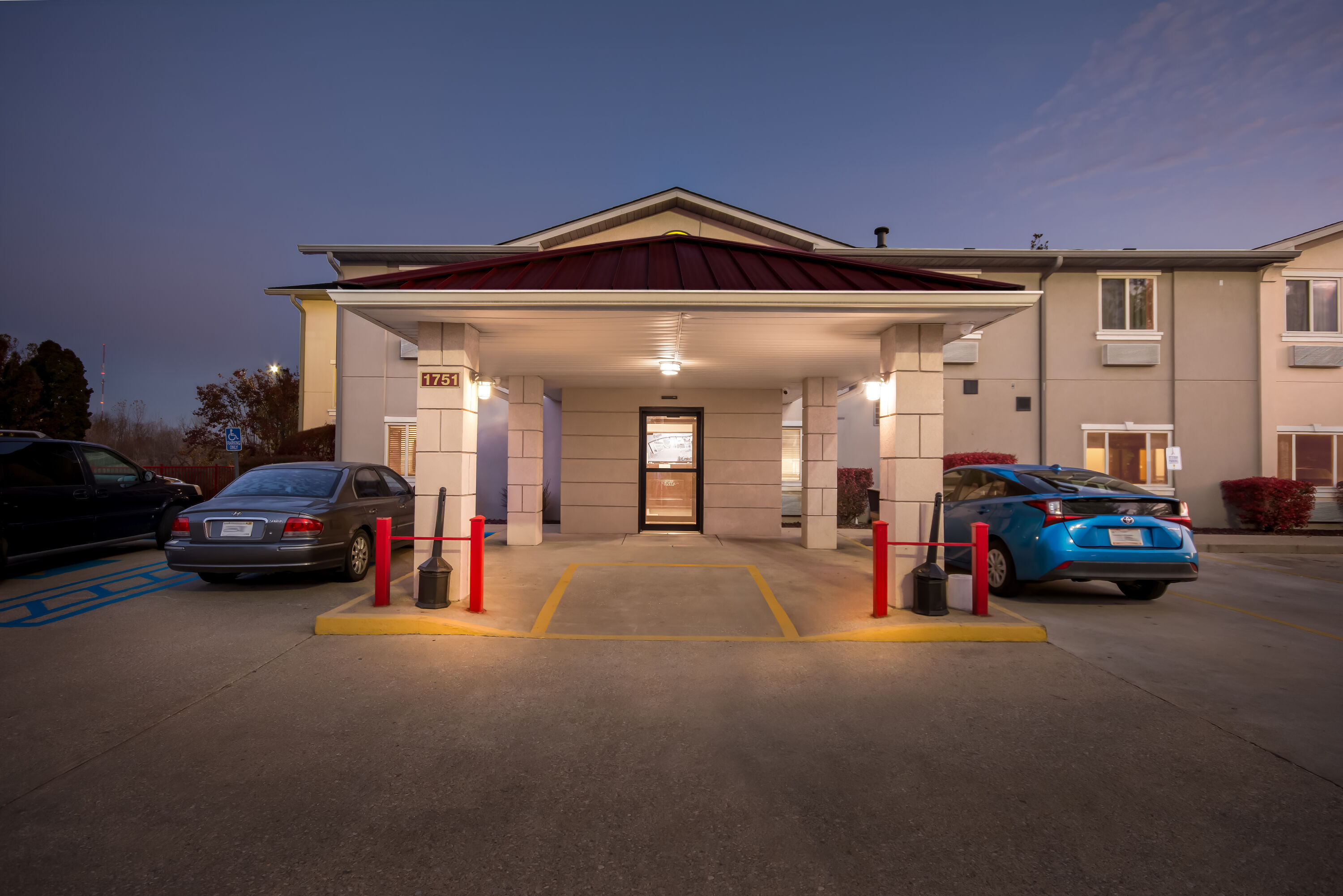 Exterior Night Image of Super 8 by Wyndham Bloomington University Area hotel in Bloomington, Indiana