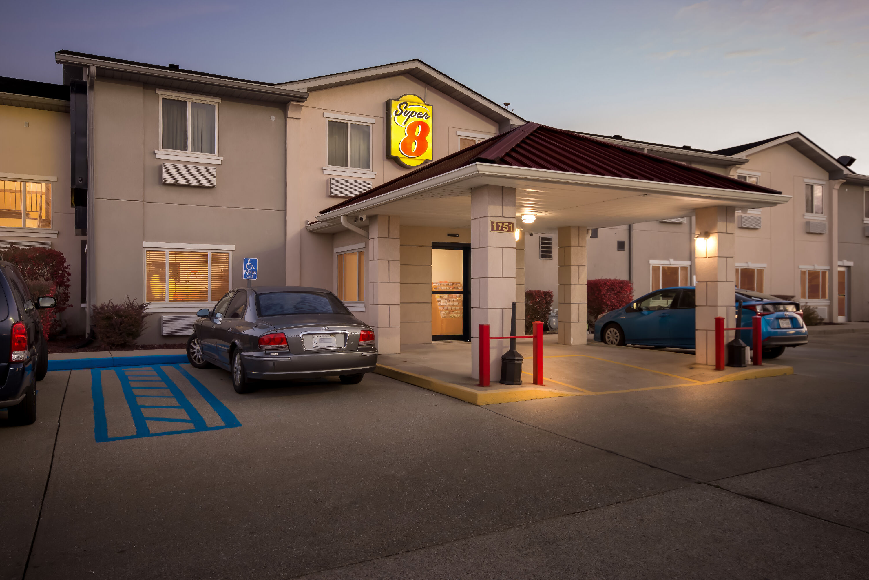 Exterior Night Image of Super 8 by Wyndham Bloomington University Area hotel in Bloomington, Indiana