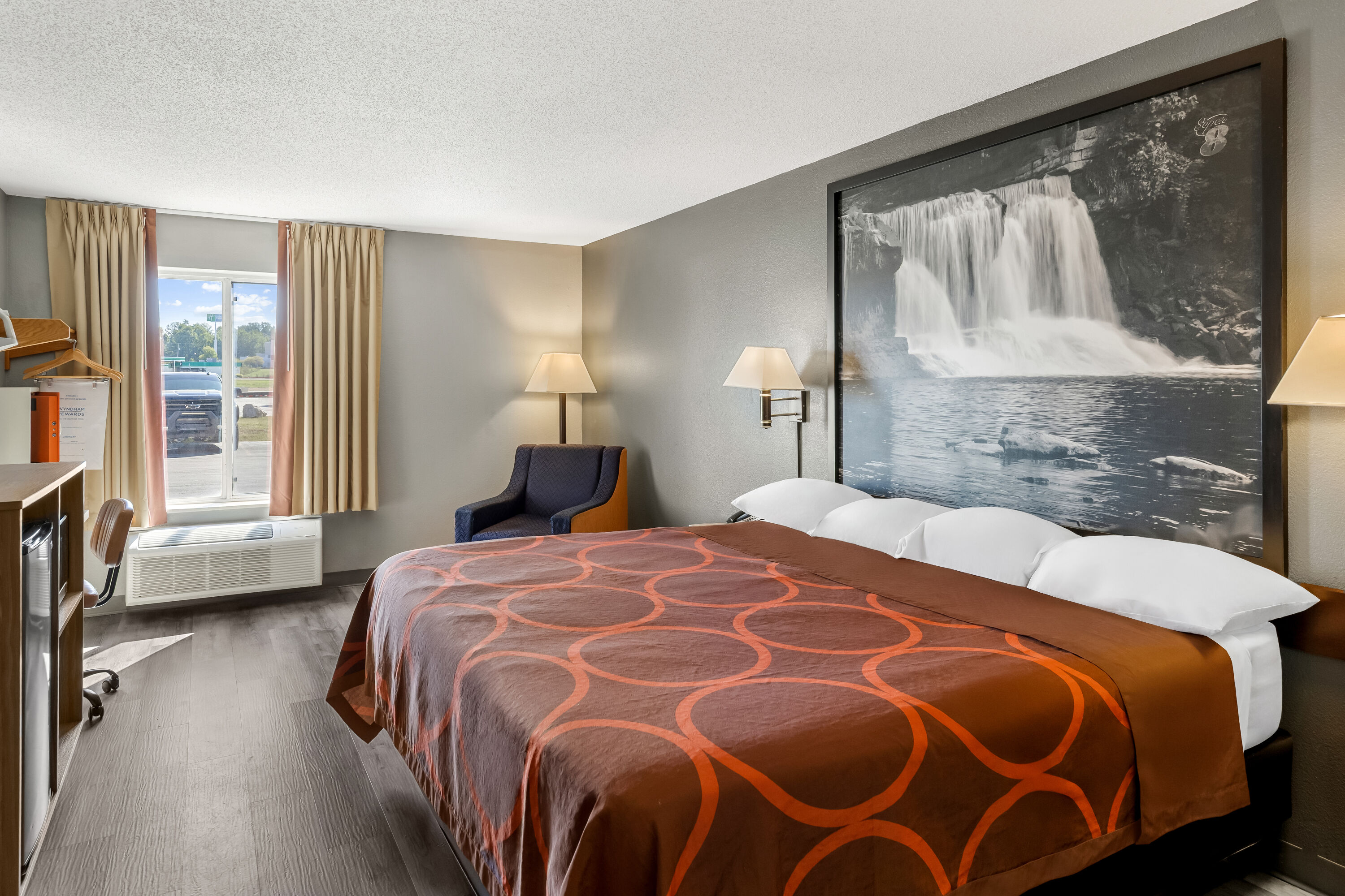 King bed guest room at the Super 8 by Wyndham Cloverdale IN in Cloverdale, Indiana