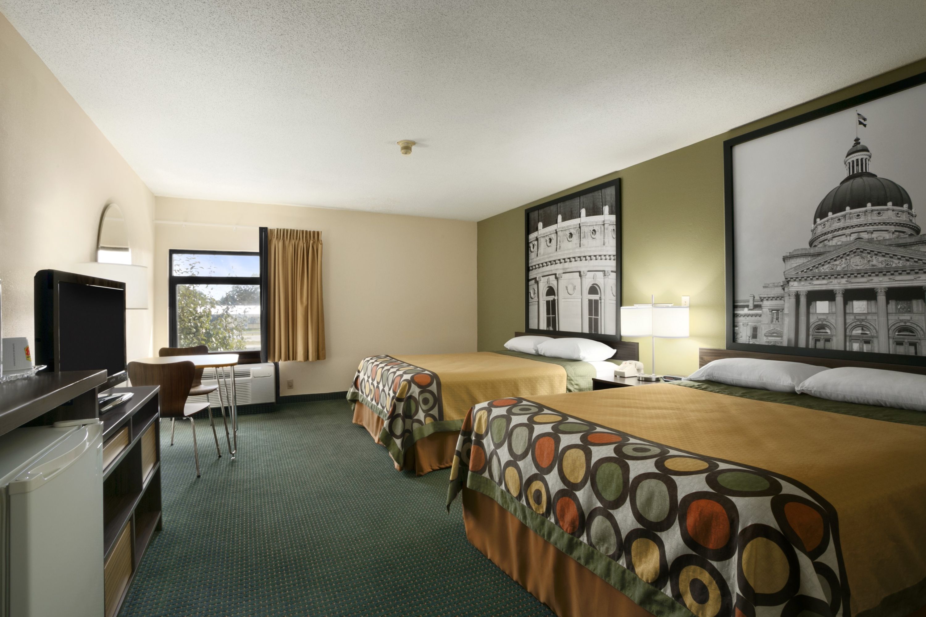 Guest room at the Super 8 by Wyndham Columbia City in Columbia City, Indiana