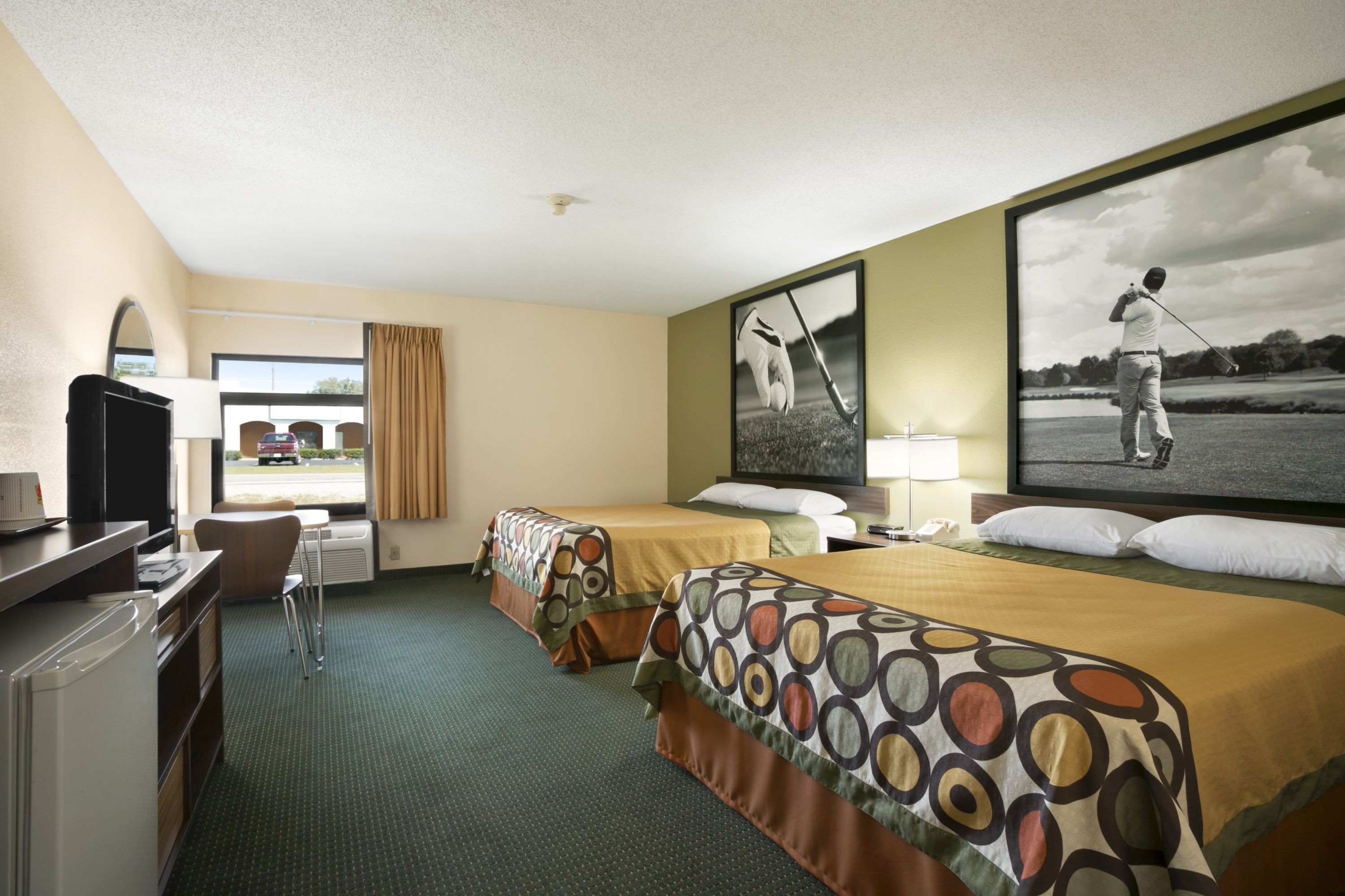 Guest room at the Super 8 by Wyndham Columbia City in Columbia City, Indiana
