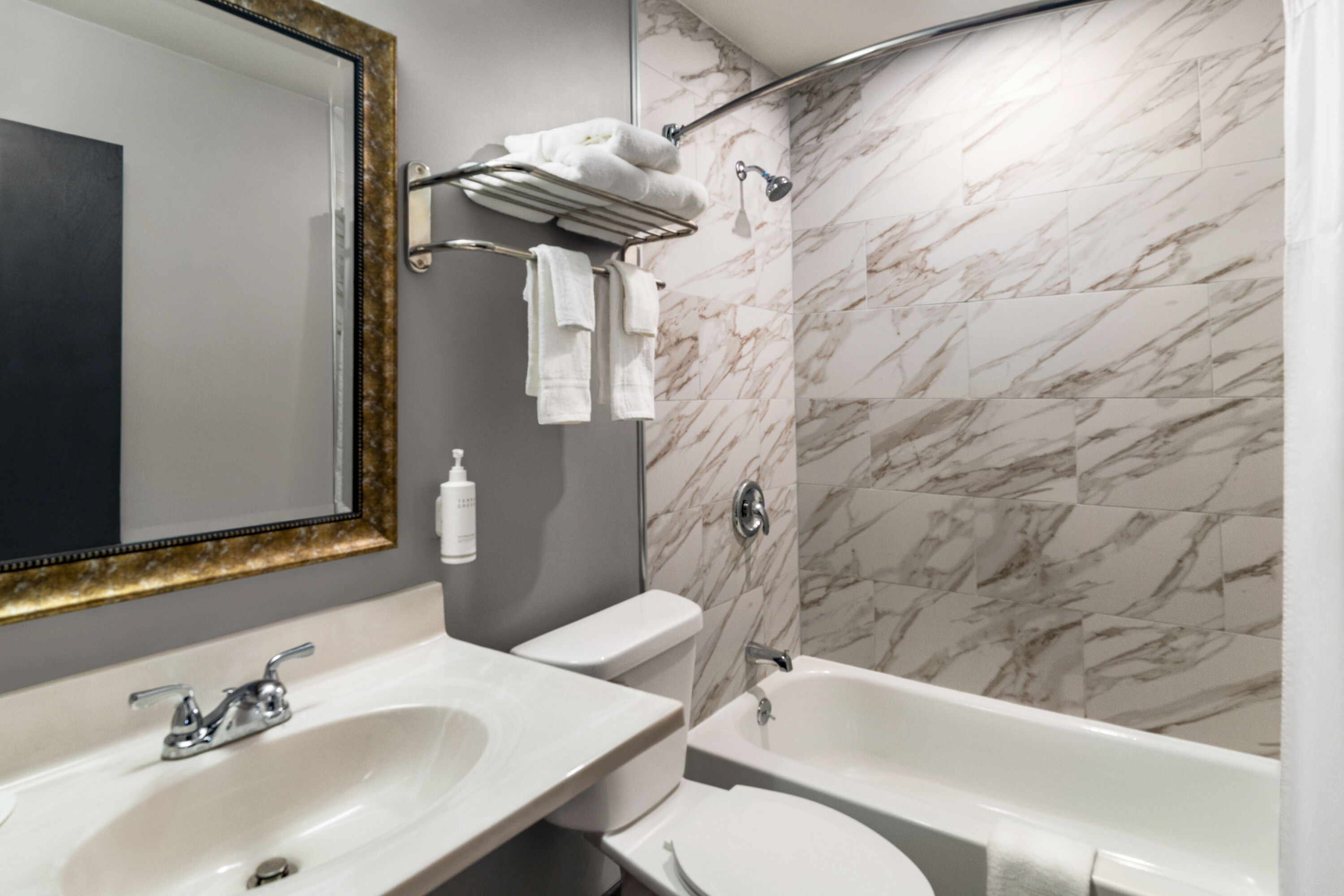 Guest room bath at the Super 8 by Wyndham Columbus/Edinburgh in Columbus, Indiana