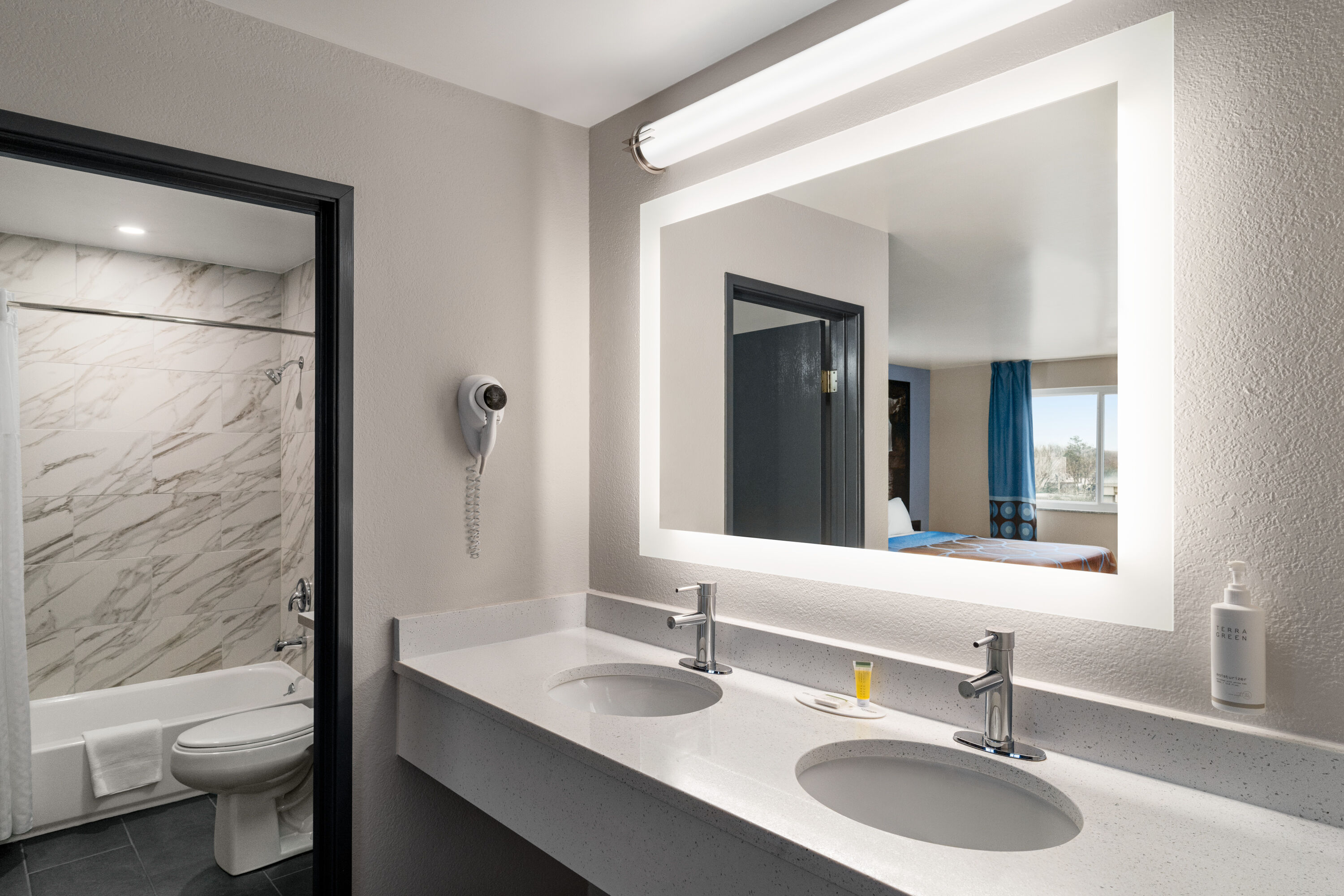 Guest room bath at the Super 8 by Wyndham Columbus/Edinburgh in Columbus, Indiana