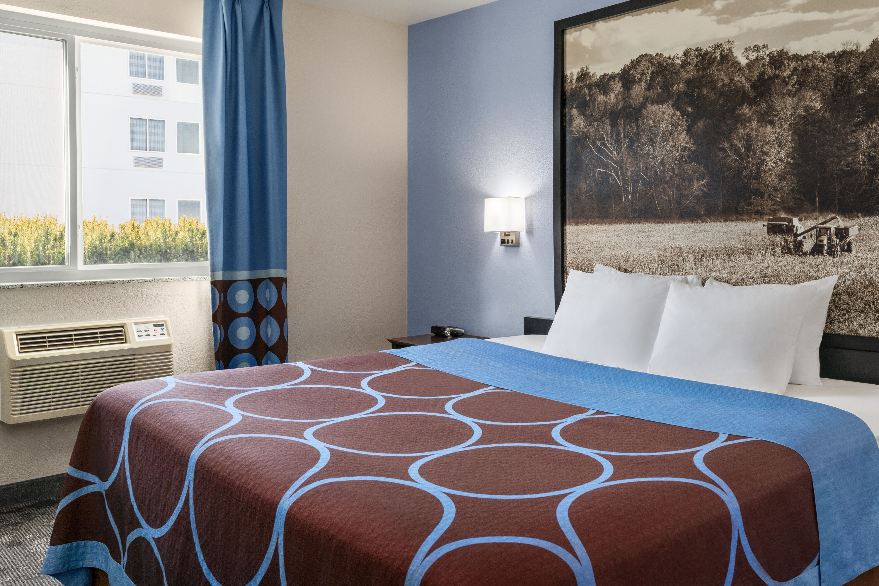 Guest room at the Super 8 by Wyndham Columbus/Edinburgh in Columbus, Indiana