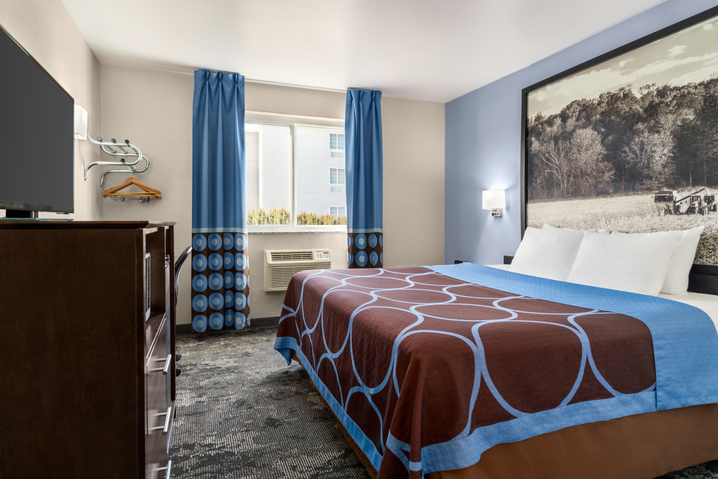 Guest room at the Super 8 by Wyndham Columbus/Edinburgh in Columbus, Indiana