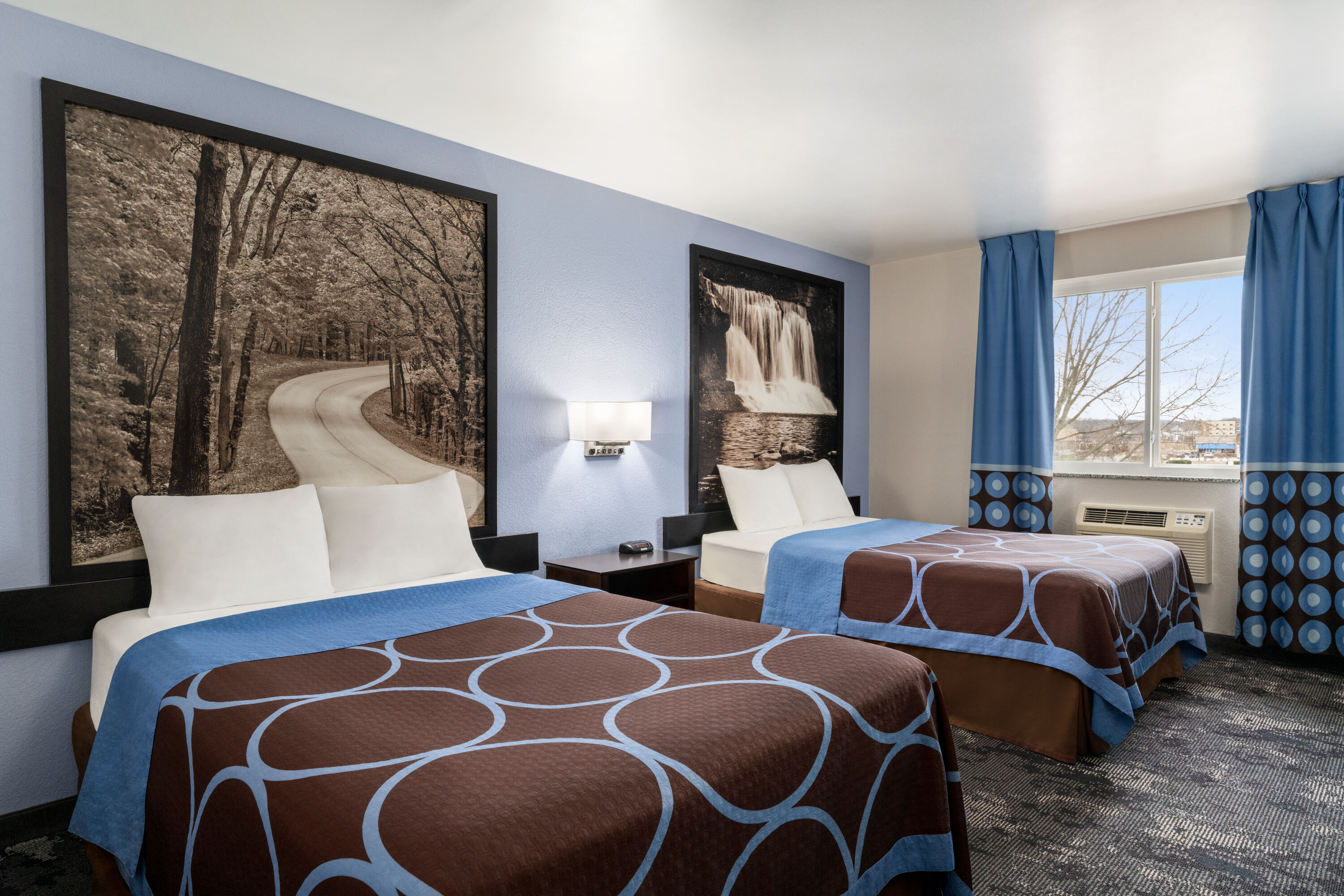 Guest room at the Super 8 by Wyndham Columbus/Edinburgh in Columbus, Indiana
