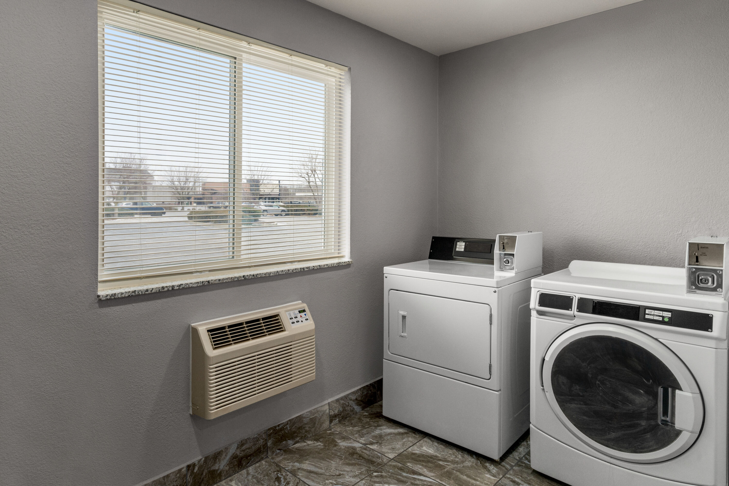 Laundry facilities at Super 8 by Wyndham Columbus/Edinburgh in Columbus, Indiana