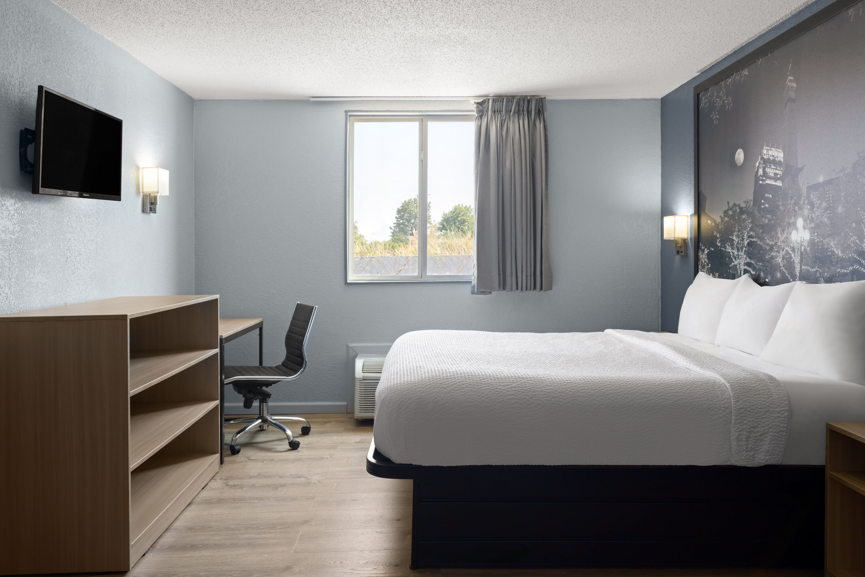 Guest room at the Super 8 by Wyndham Fort Wayne in Fort Wayne, Indiana