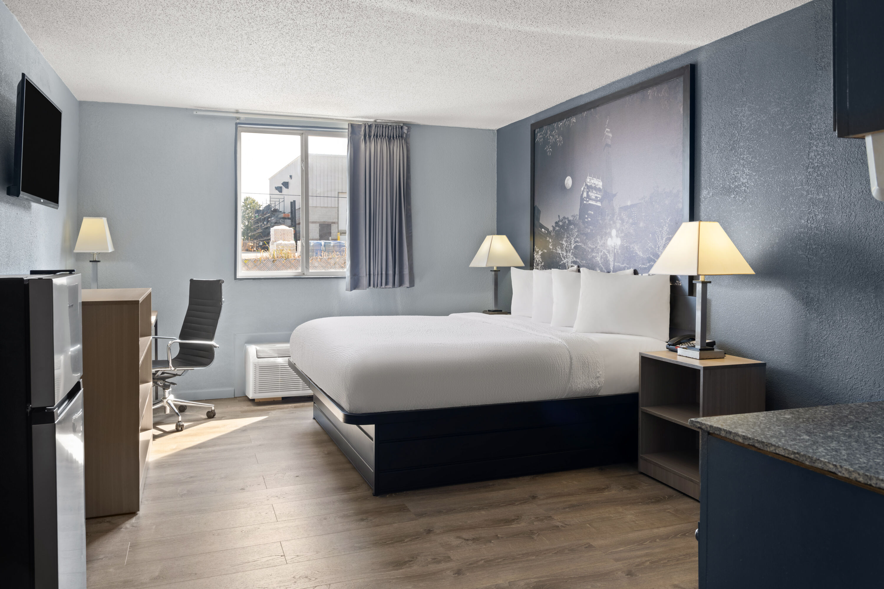 Guest room at the Super 8 by Wyndham Fort Wayne in Fort Wayne, Indiana