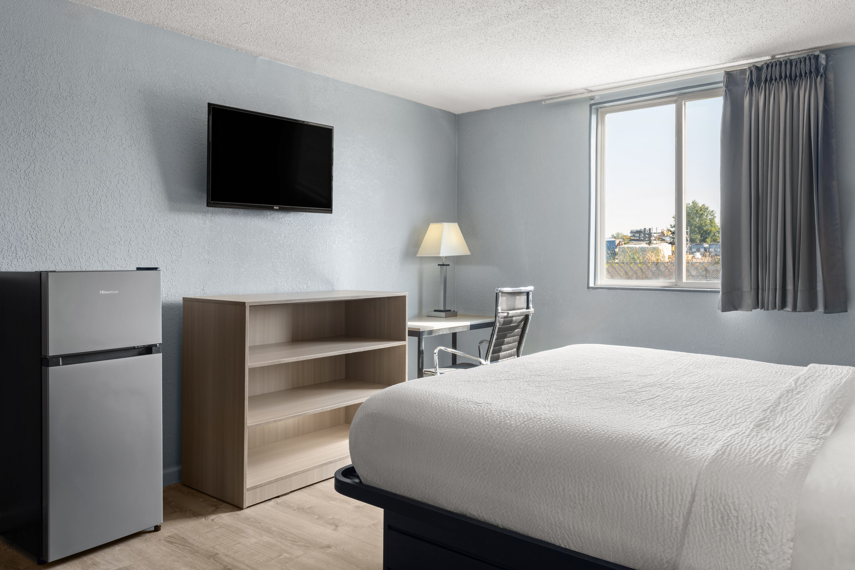 Guest room at the Super 8 by Wyndham Fort Wayne in Fort Wayne, Indiana