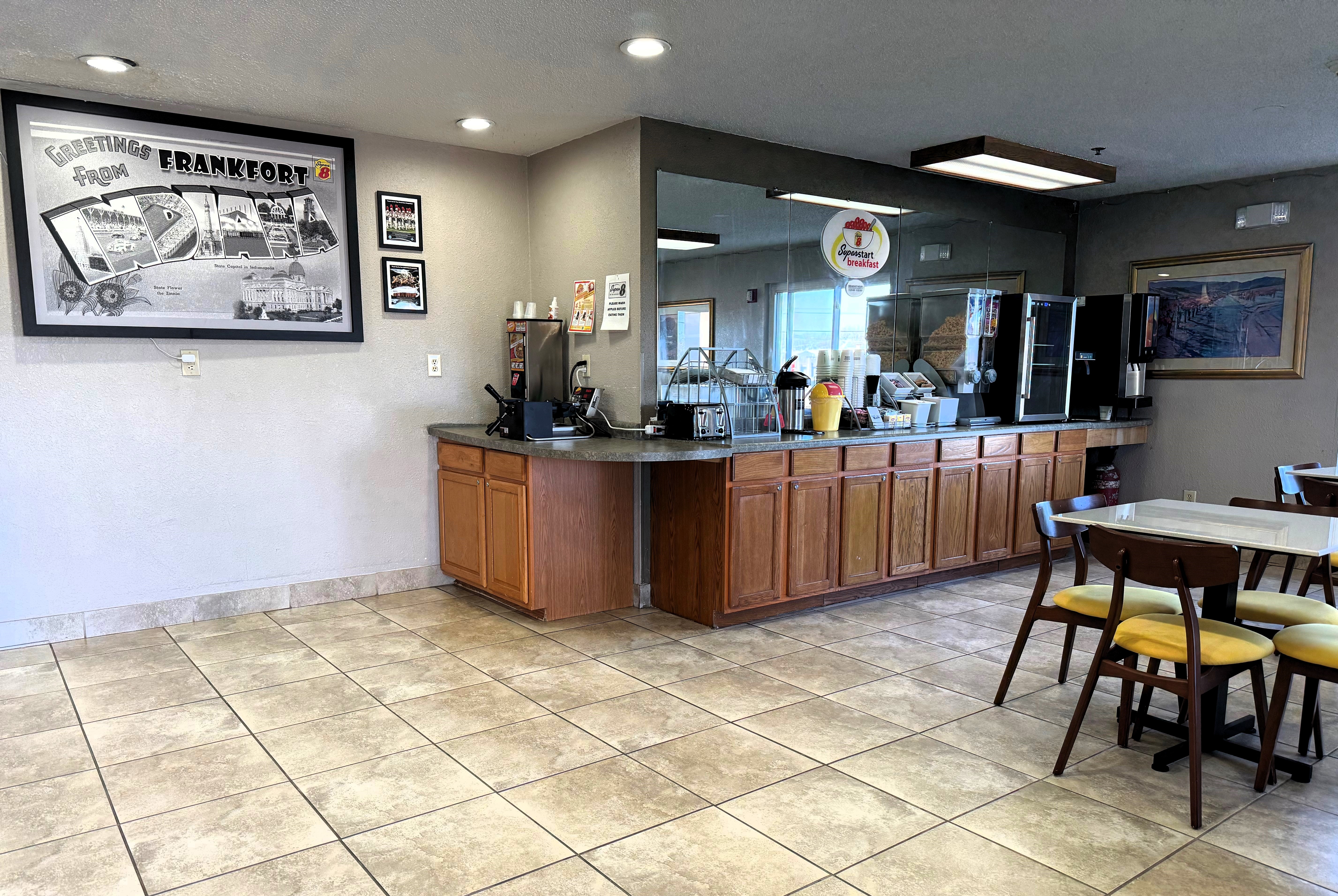 Super 8 by Wyndham Frankfort IN restaurant breakfast area with seating in Frankfort, Indiana