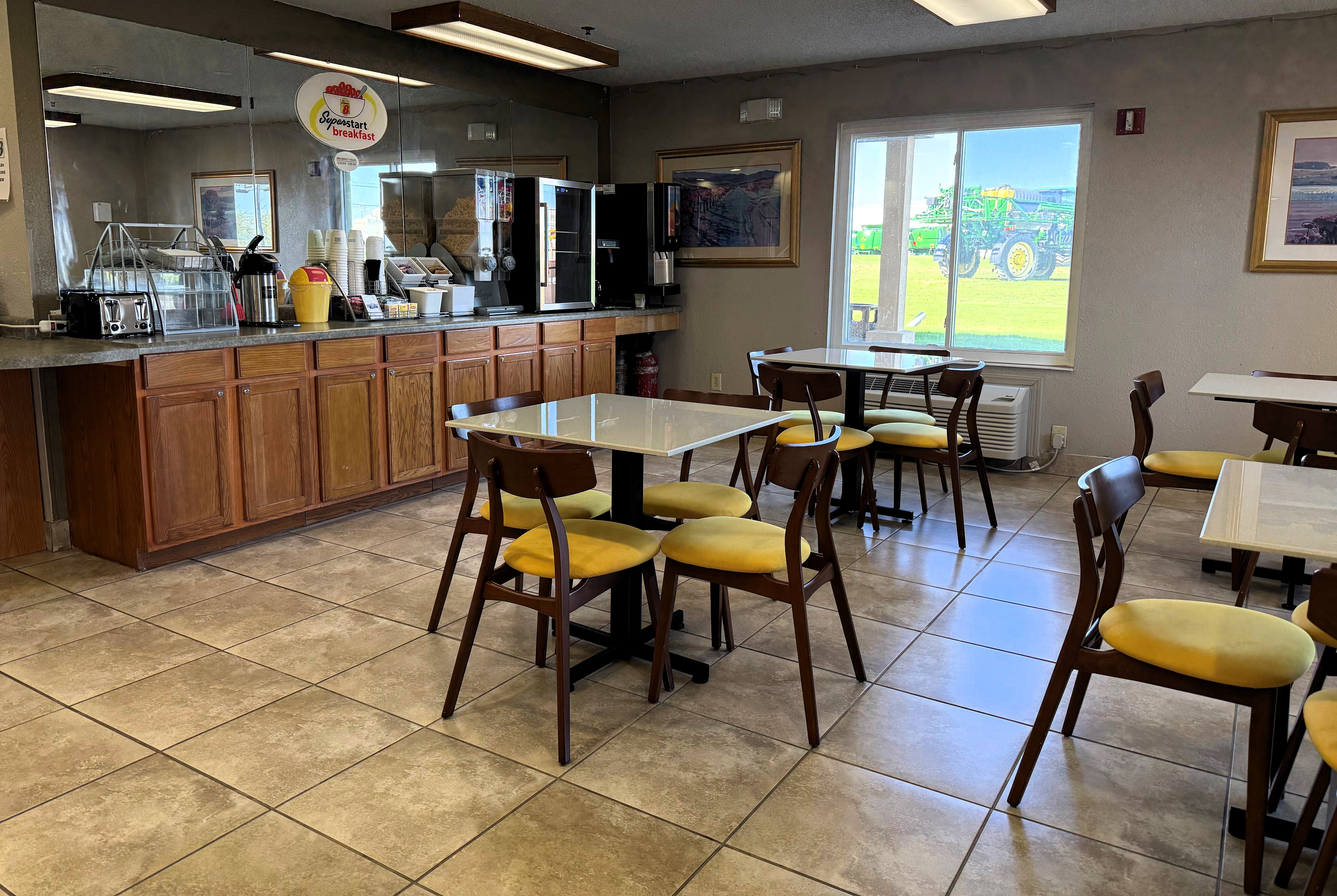 Super 8 by Wyndham Frankfort IN restaurant breakfast area with seating in Frankfort, Indiana