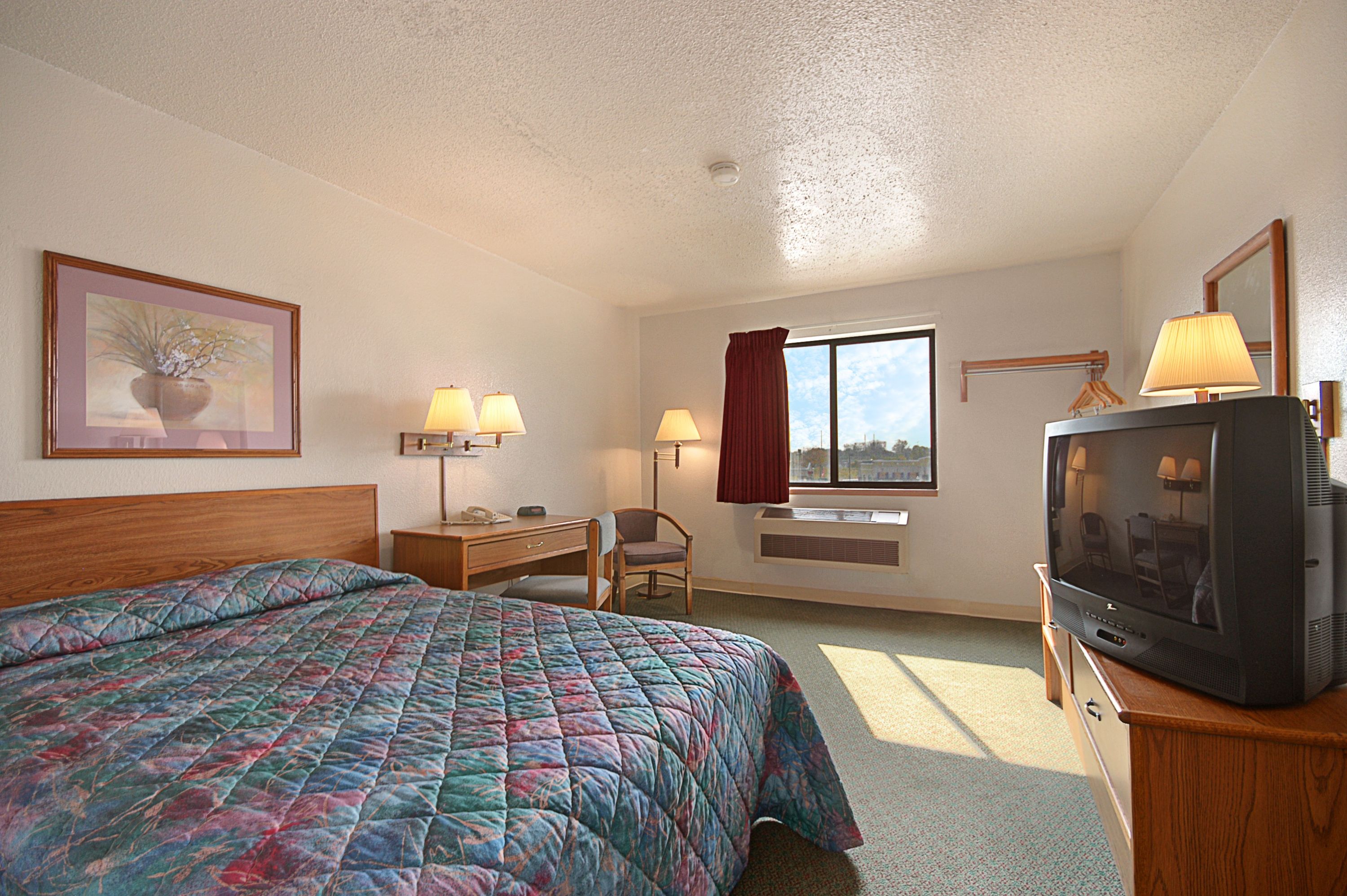 Guest room at the Super 8 by Wyndham Hammond/North in Hammond, Indiana