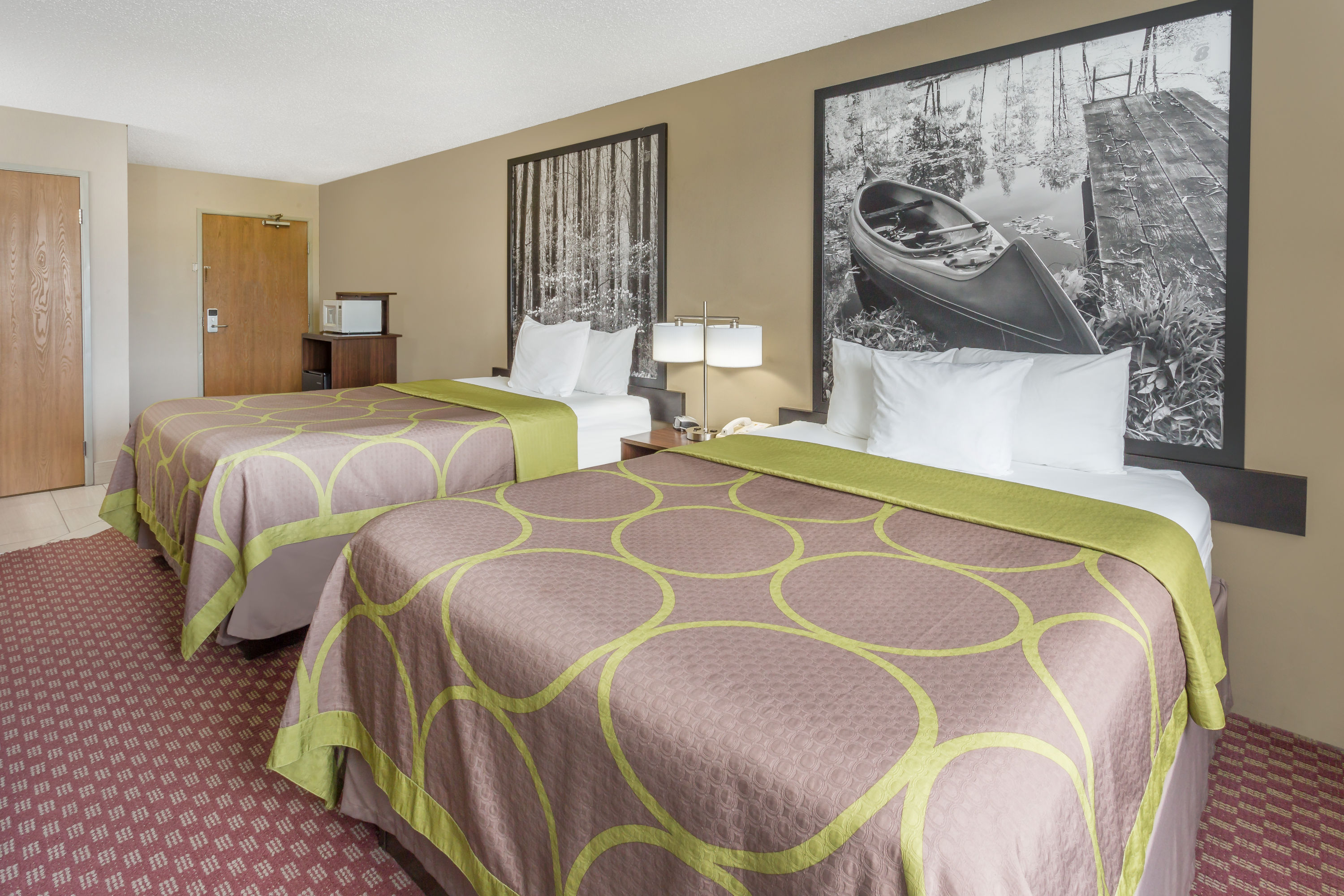 Guest room at the Super 8 by Wyndham Hebron Lowell Area in Hebron, Indiana