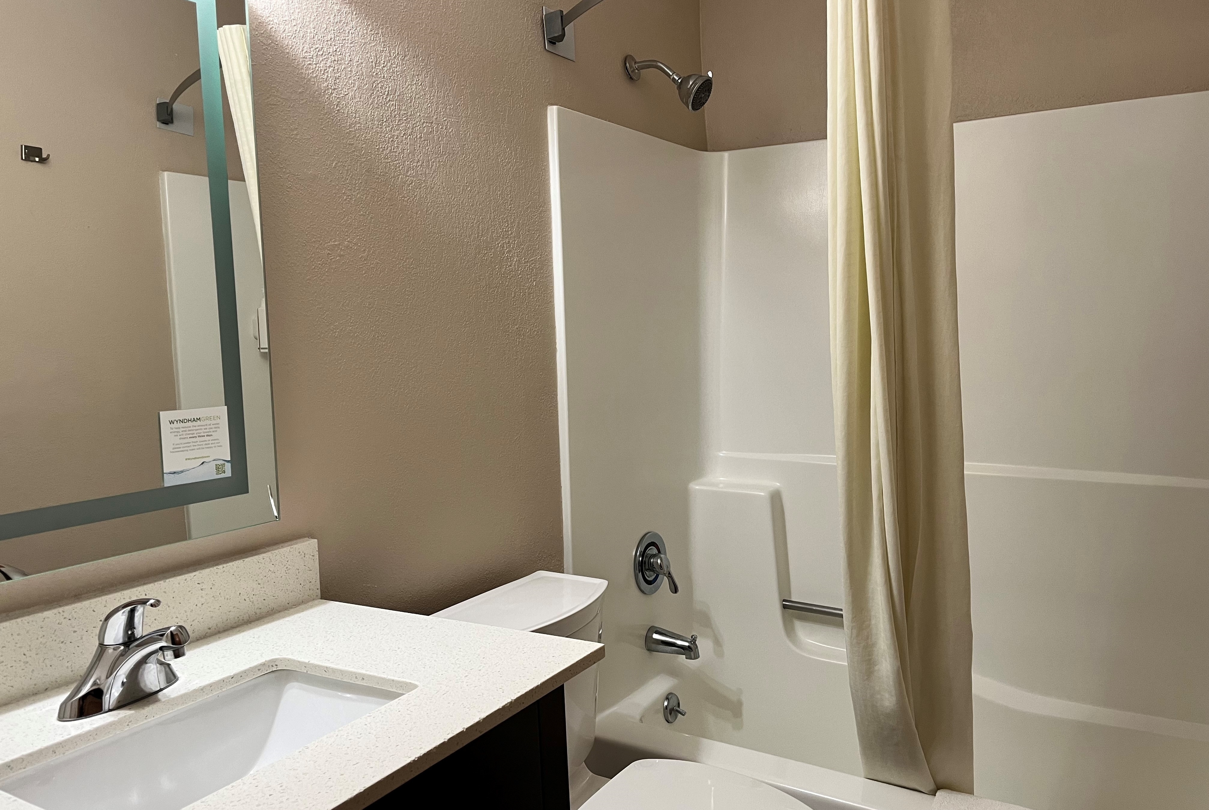Guest room bath at the Super 8 by Wyndham Indianapolis/Emerson Ave in Indianapolis, Indiana