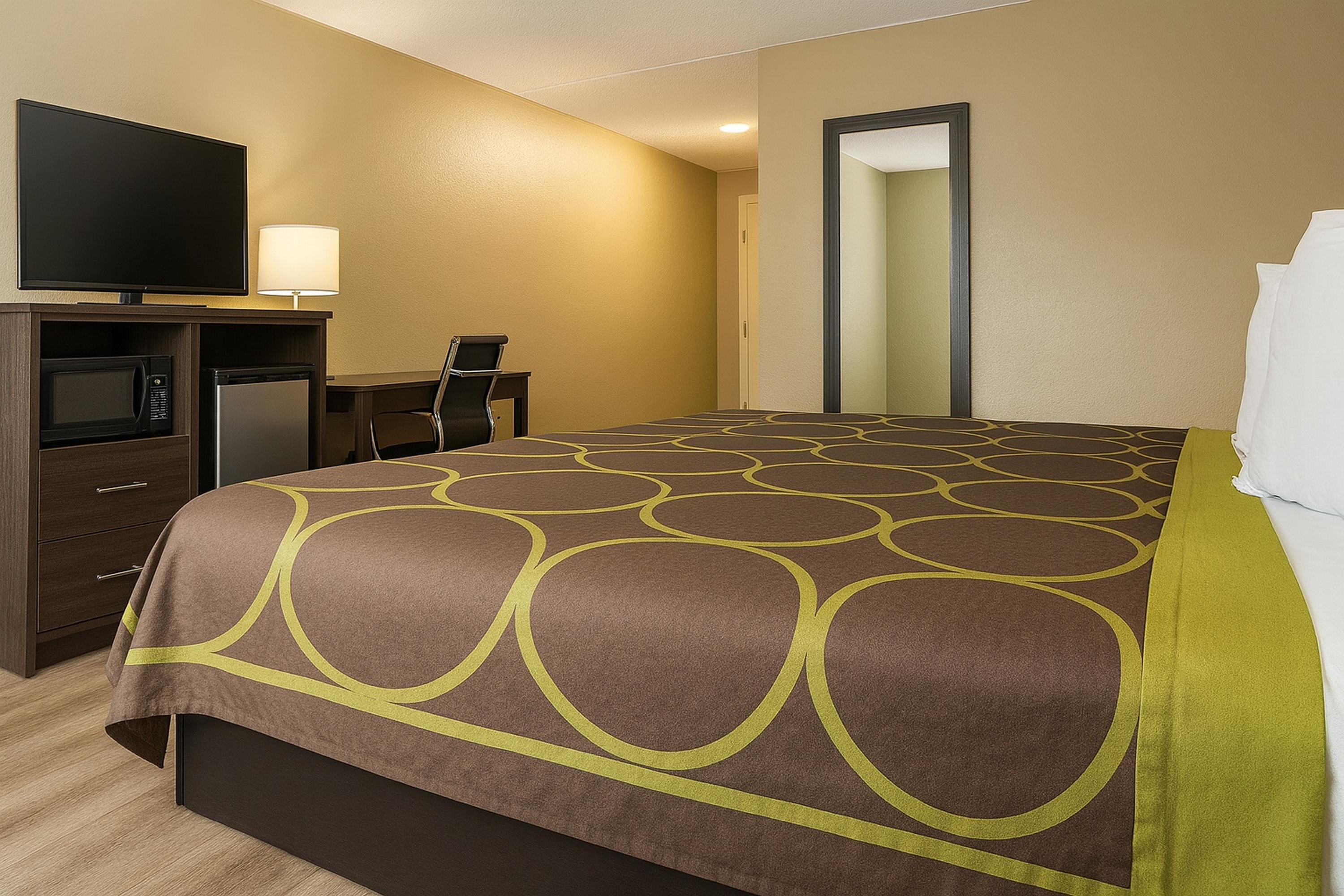 Guest room at the Super 8 by Wyndham Indianapolis South in Indianapolis, Indiana