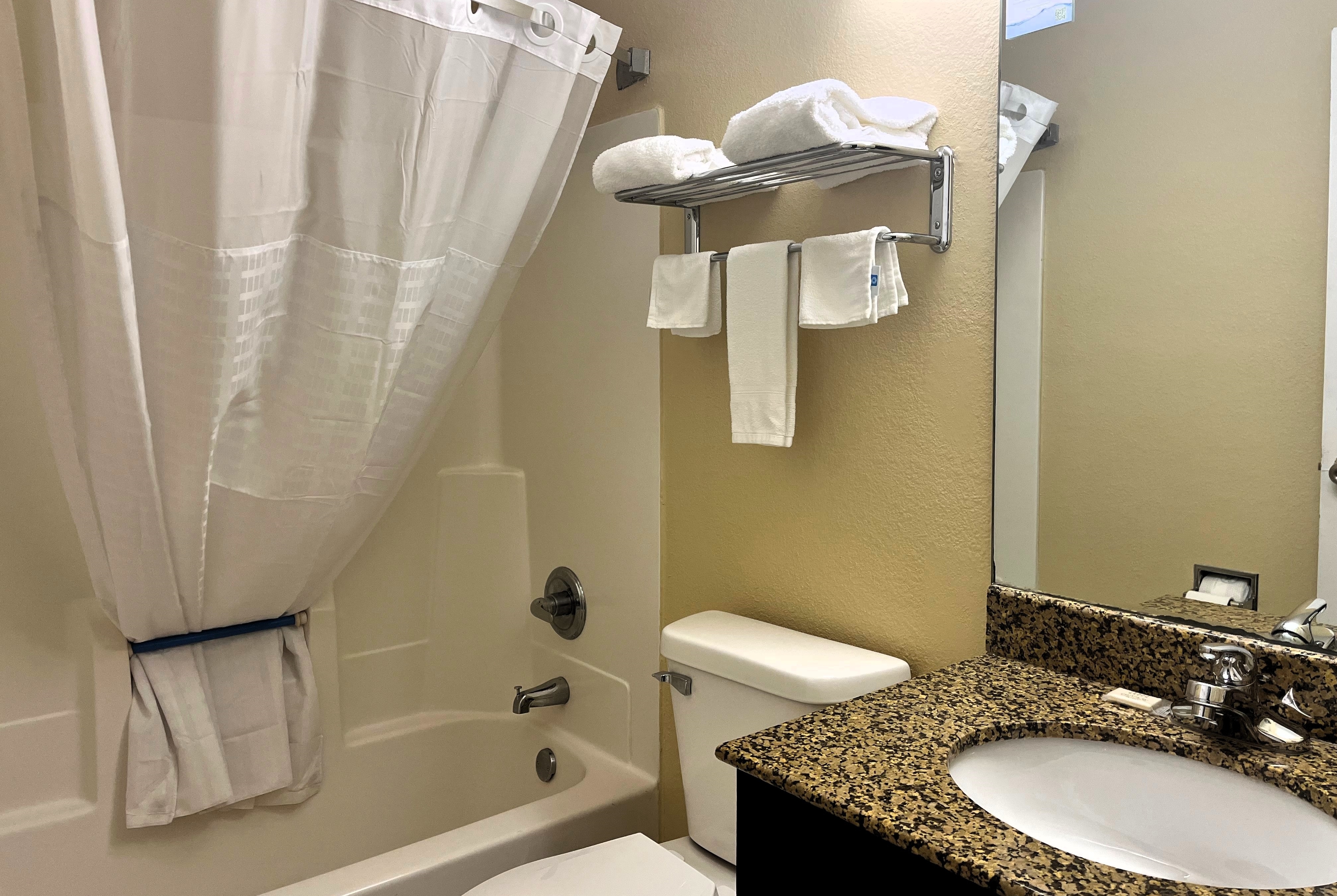 Guest room bath at the Super 8 by Wyndham Indianapolis/NE/Castleton Area in Indianapolis, Indiana