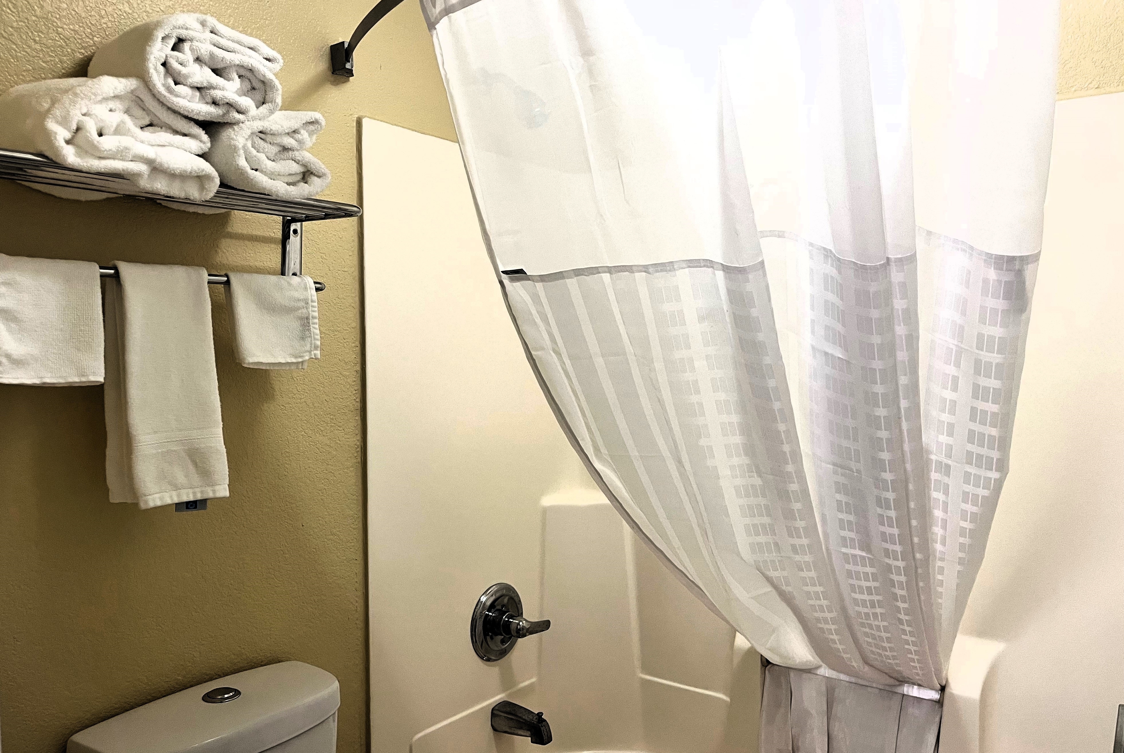 Guest room bath at the Super 8 by Wyndham Indianapolis/NE/Castleton Area in Indianapolis, Indiana
