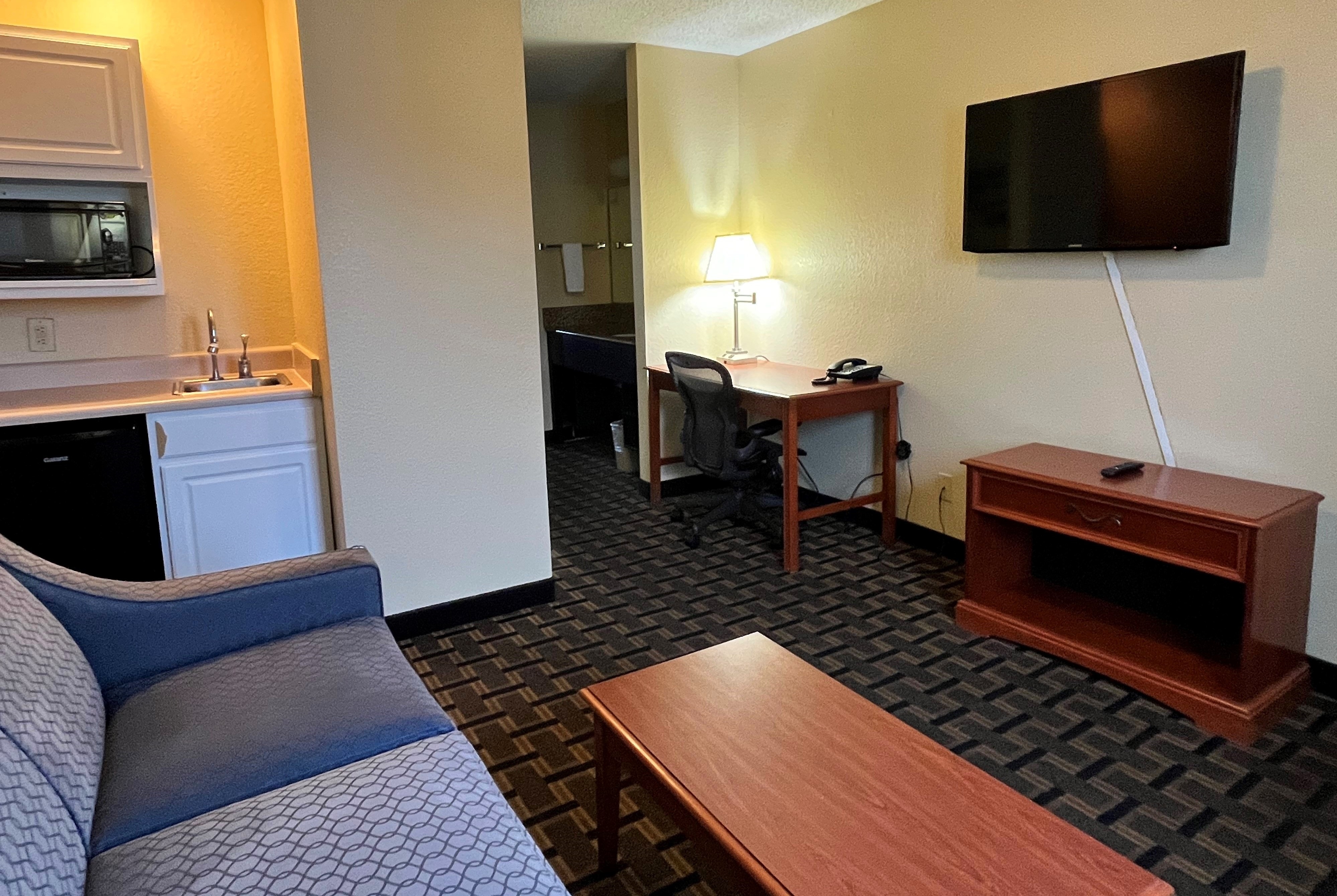 Guest room at the Super 8 by Wyndham Indianapolis/NE/Castleton Area in Indianapolis, Indiana
