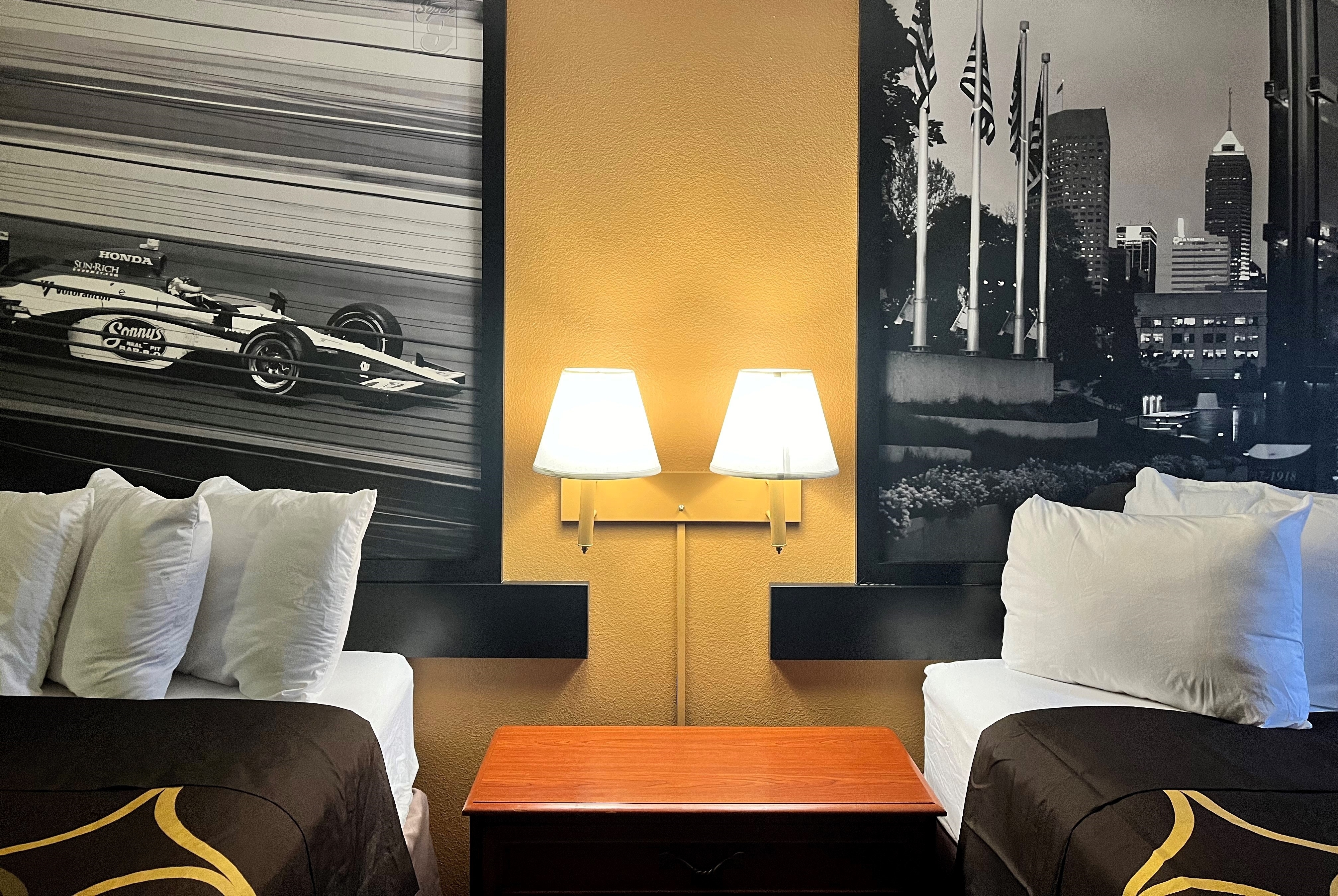 Guest room at the Super 8 by Wyndham Indianapolis/NE/Castleton Area in Indianapolis, Indiana