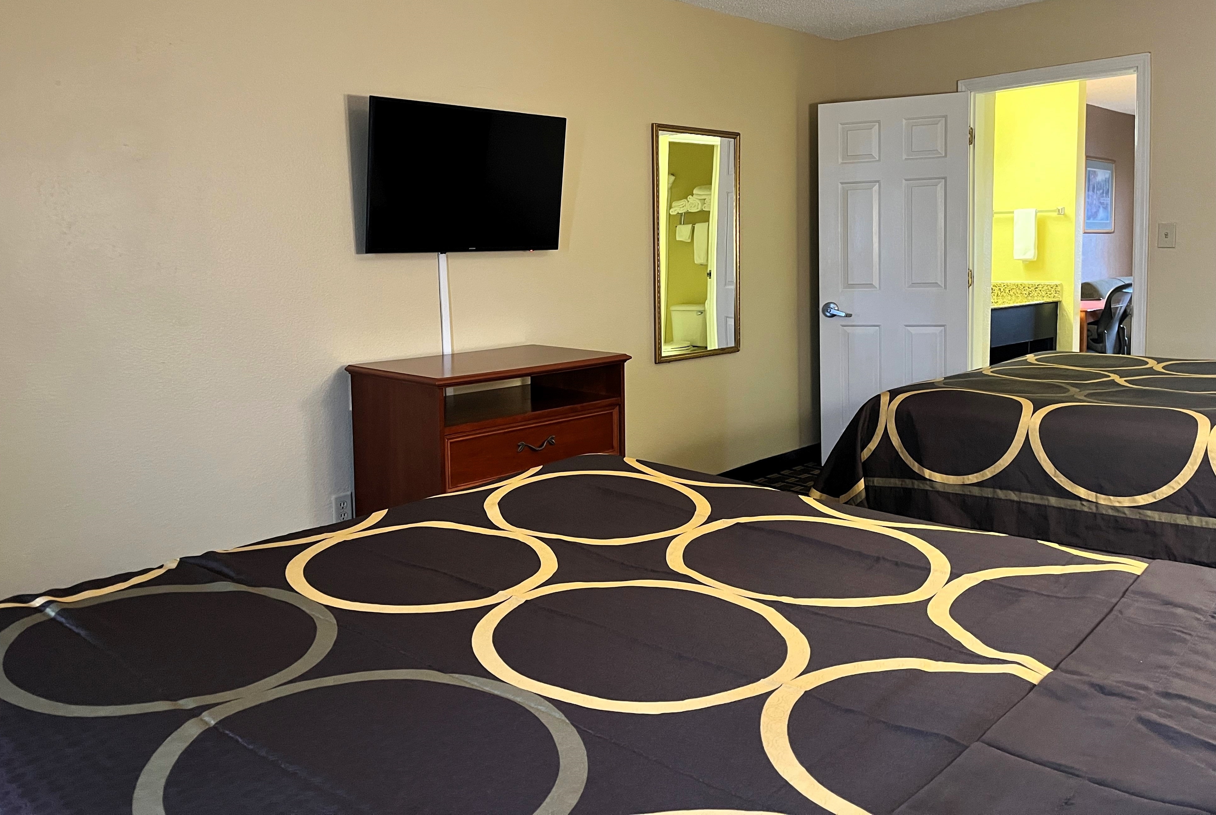 Guest room at the Super 8 by Wyndham Indianapolis/NE/Castleton Area in Indianapolis, Indiana