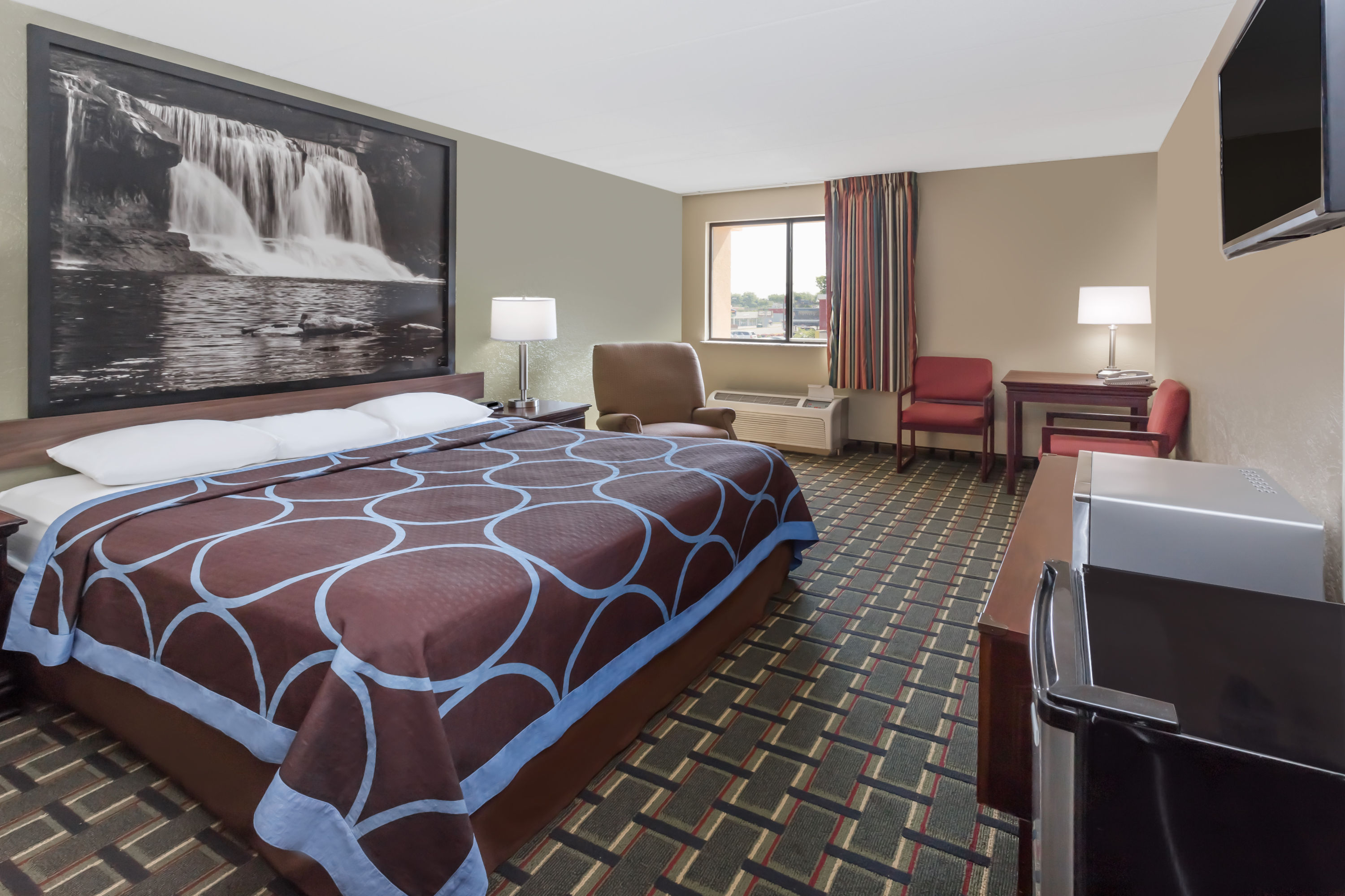 Guest room at the Super 8 by Wyndham Logansport in Logansport, Indiana