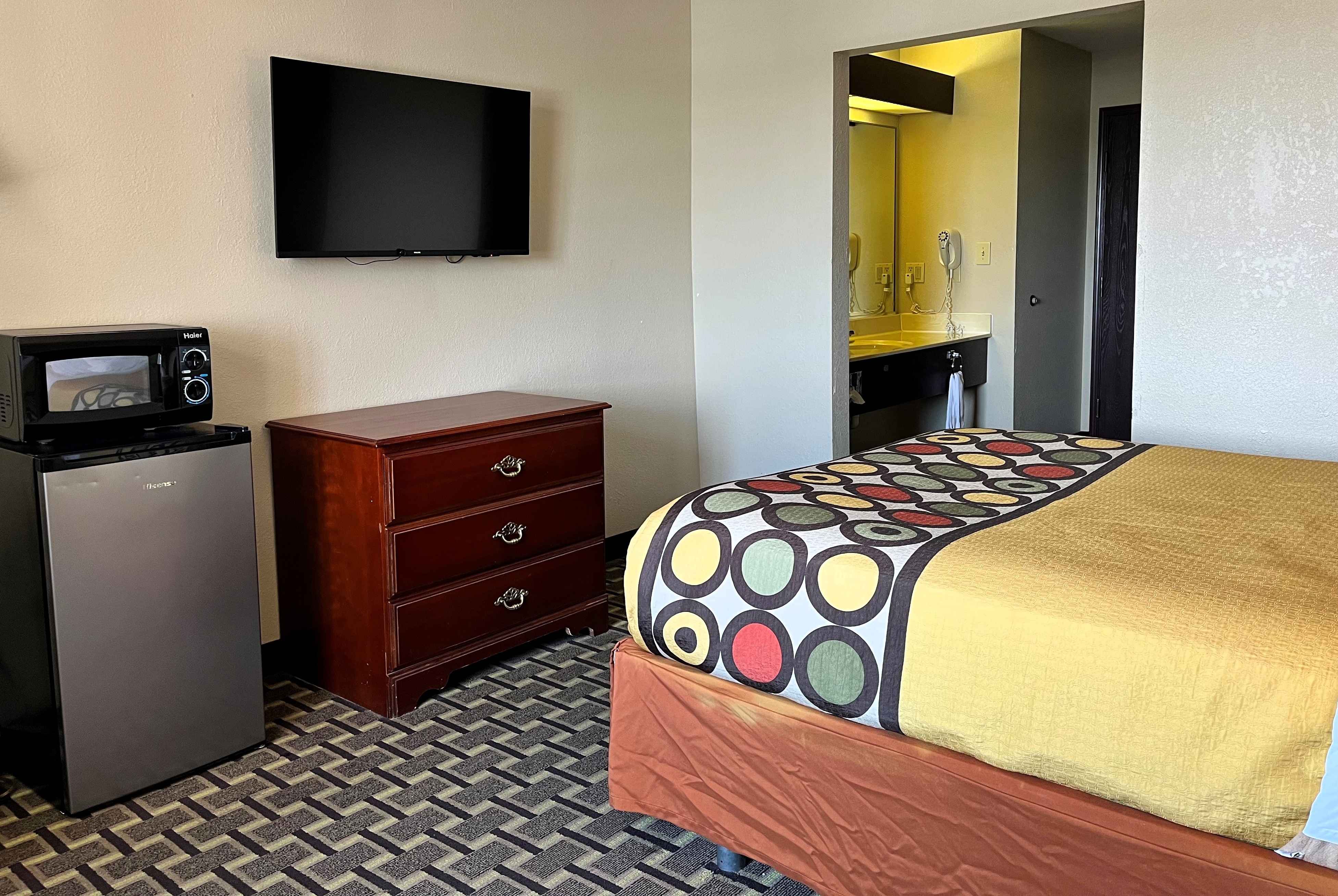 Guest room at the Super 8 by Wyndham Madison IN in Madison, Indiana