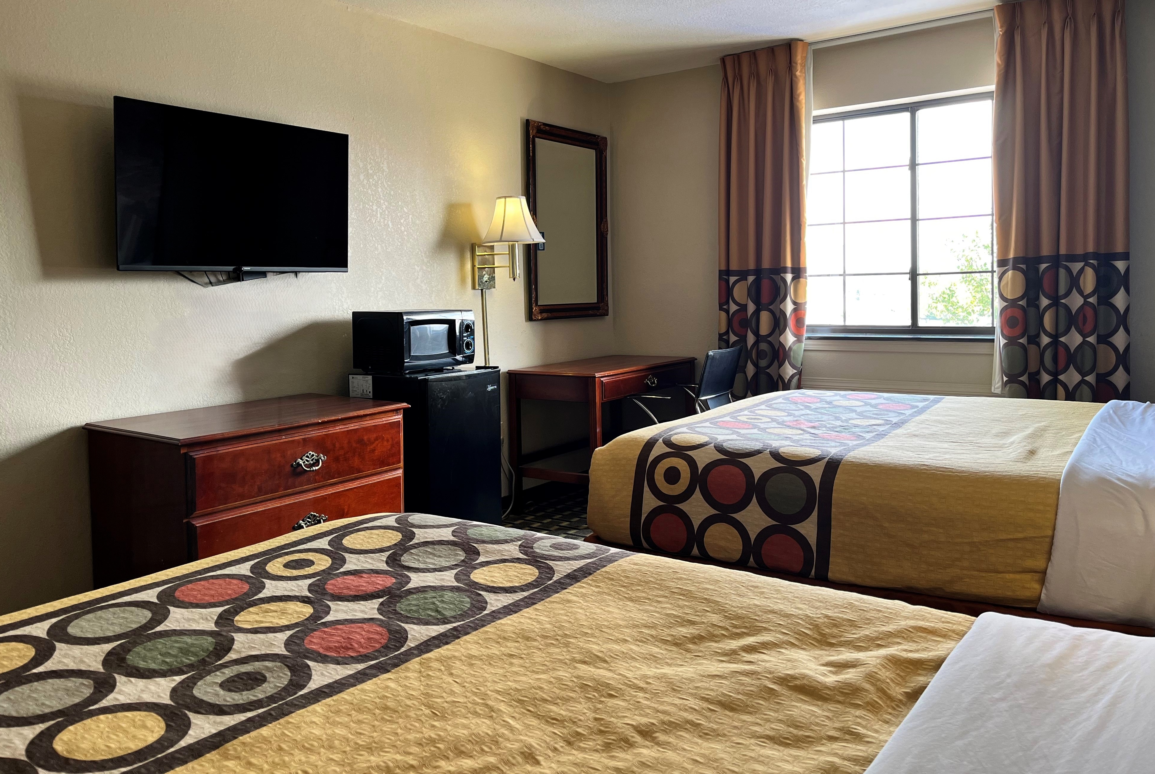 Guest room at the Super 8 by Wyndham Madison IN in Madison, Indiana