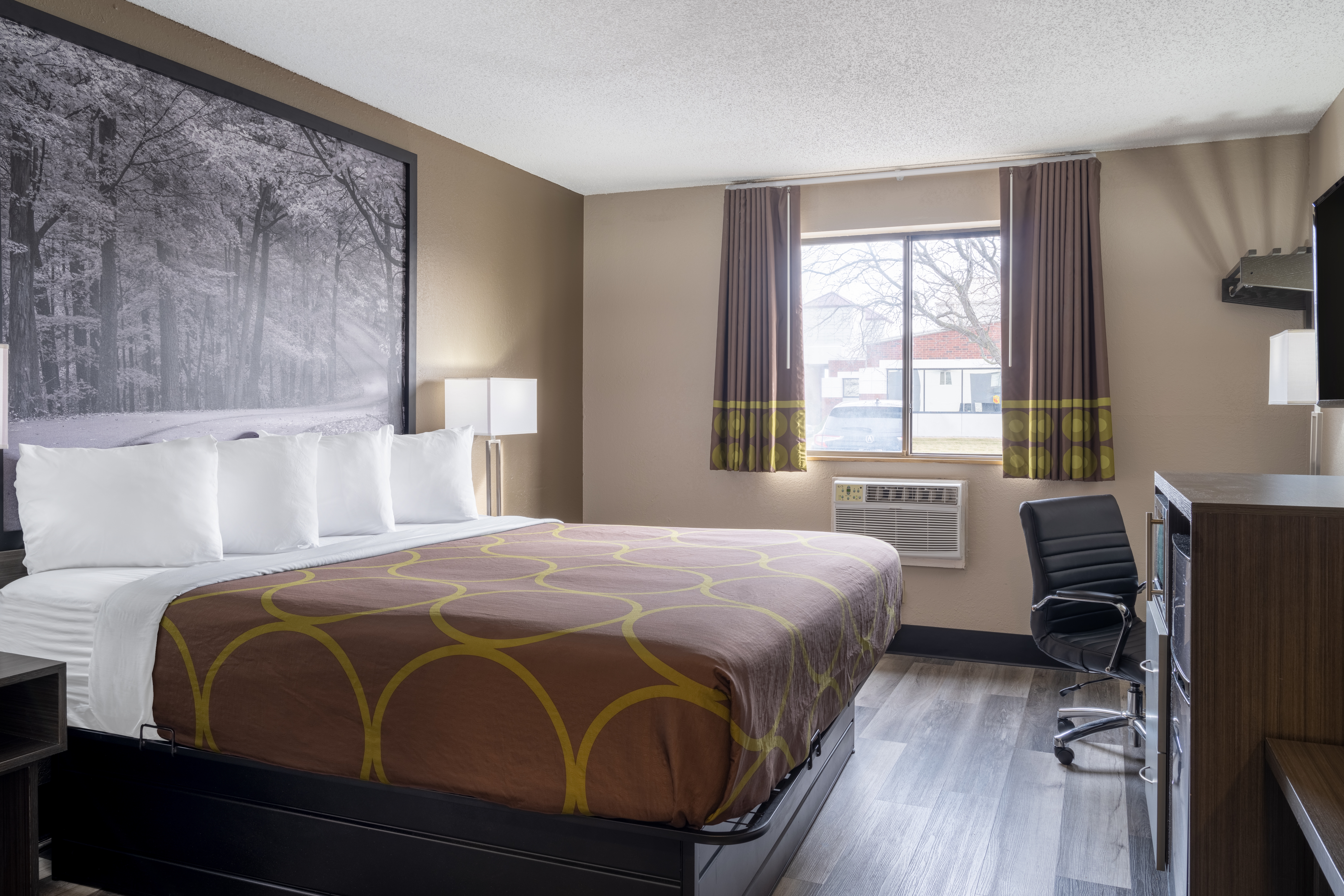 Guest room at the Super 8 by Wyndham Merrillville in Merrillville, Indiana