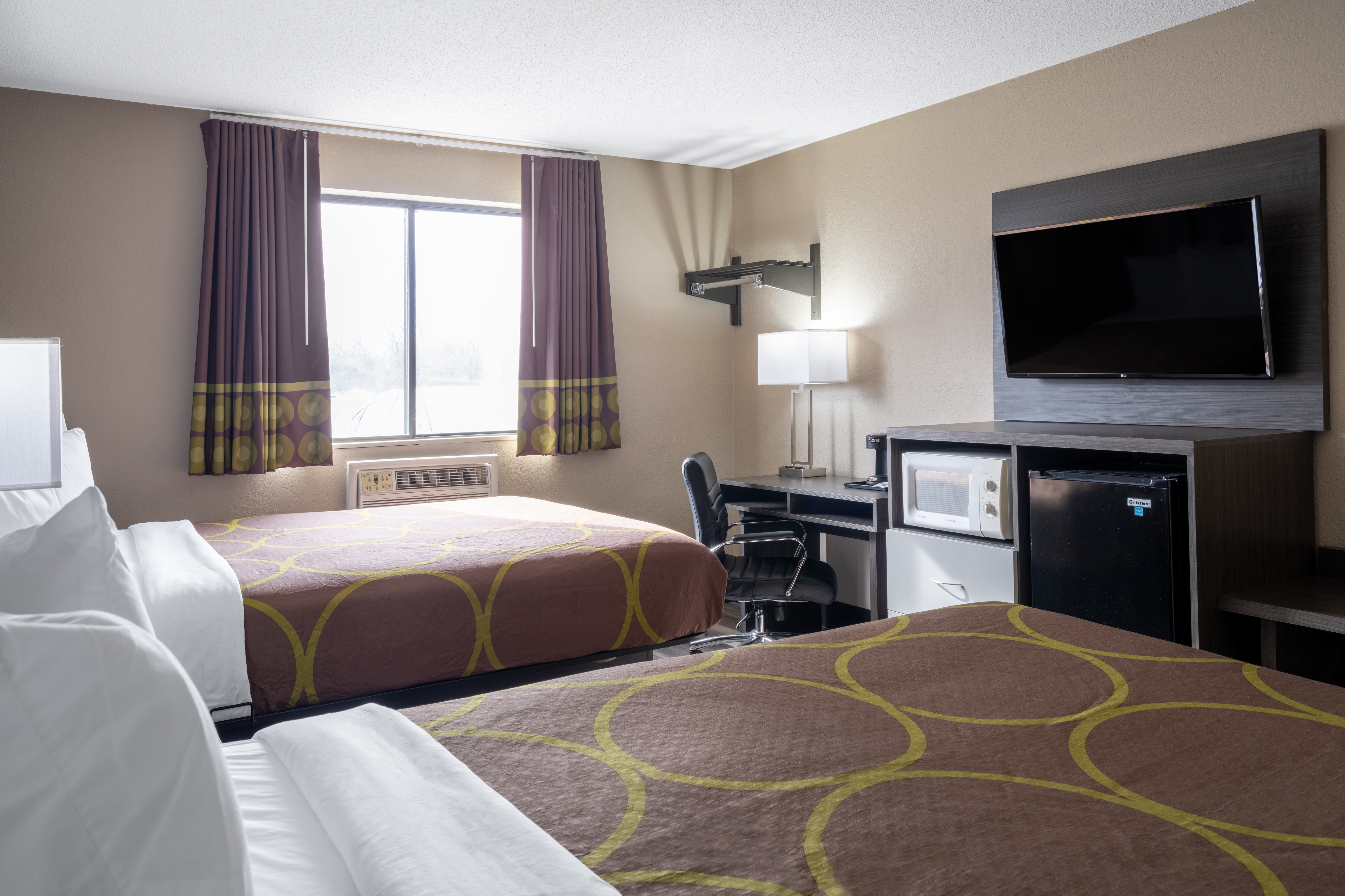 Guest room at the Super 8 by Wyndham Merrillville in Merrillville, Indiana