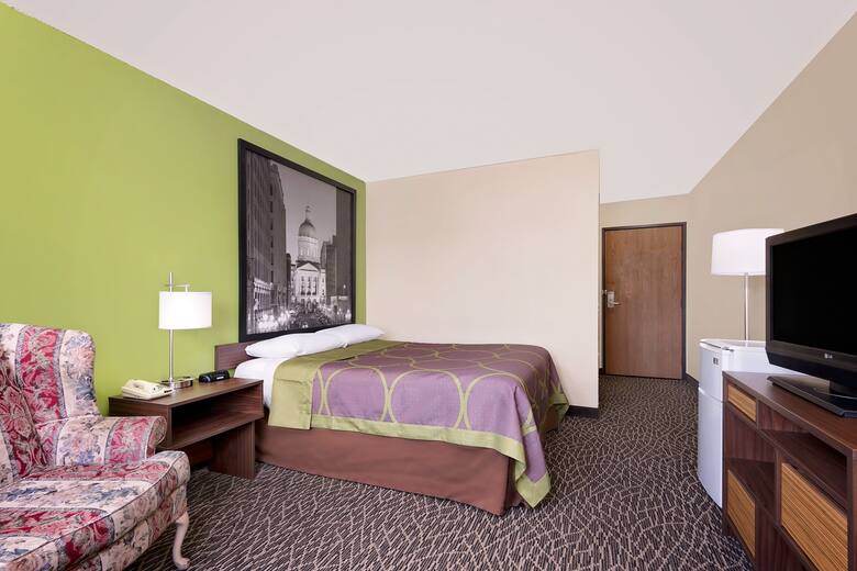 Guest room at the Super 8 Muncie/Ball St. College Area in Muncie, Indiana