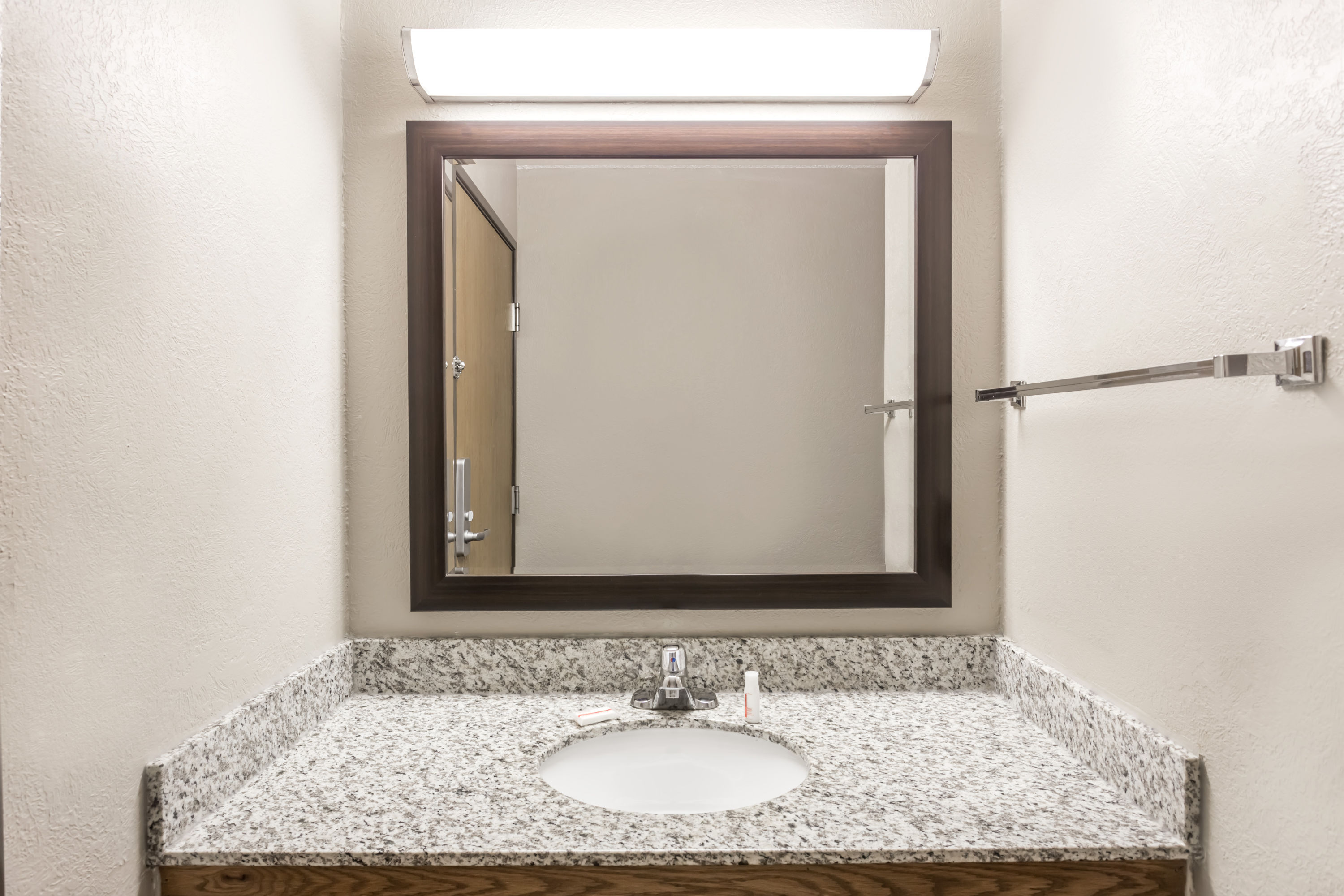 Guest room bath at the Super 8 by Wyndham Plymouth in Plymouth, Indiana