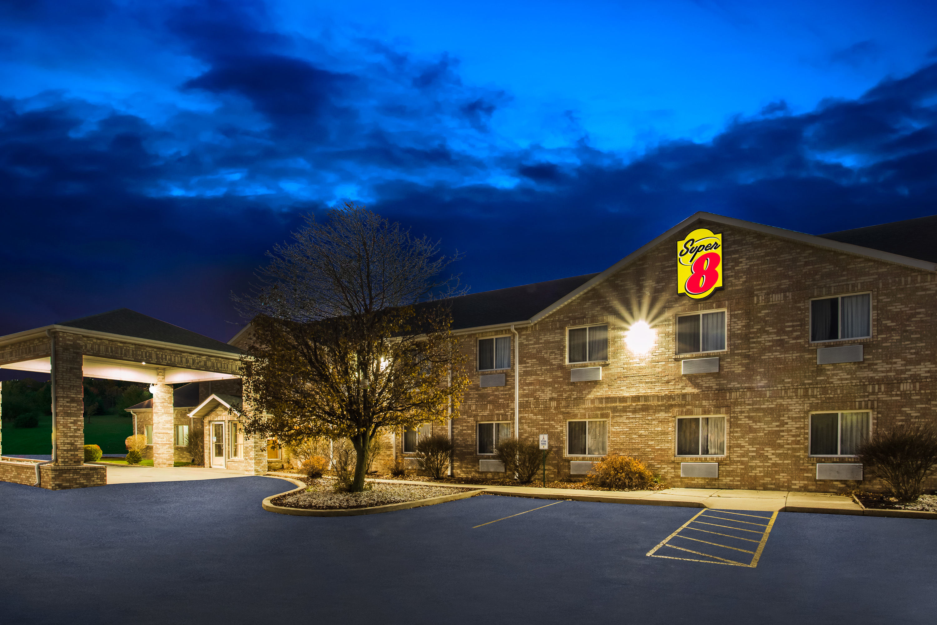 Exterior Dusk Image of Super 8 by Wyndham Remington hotel in Remington, Indiana