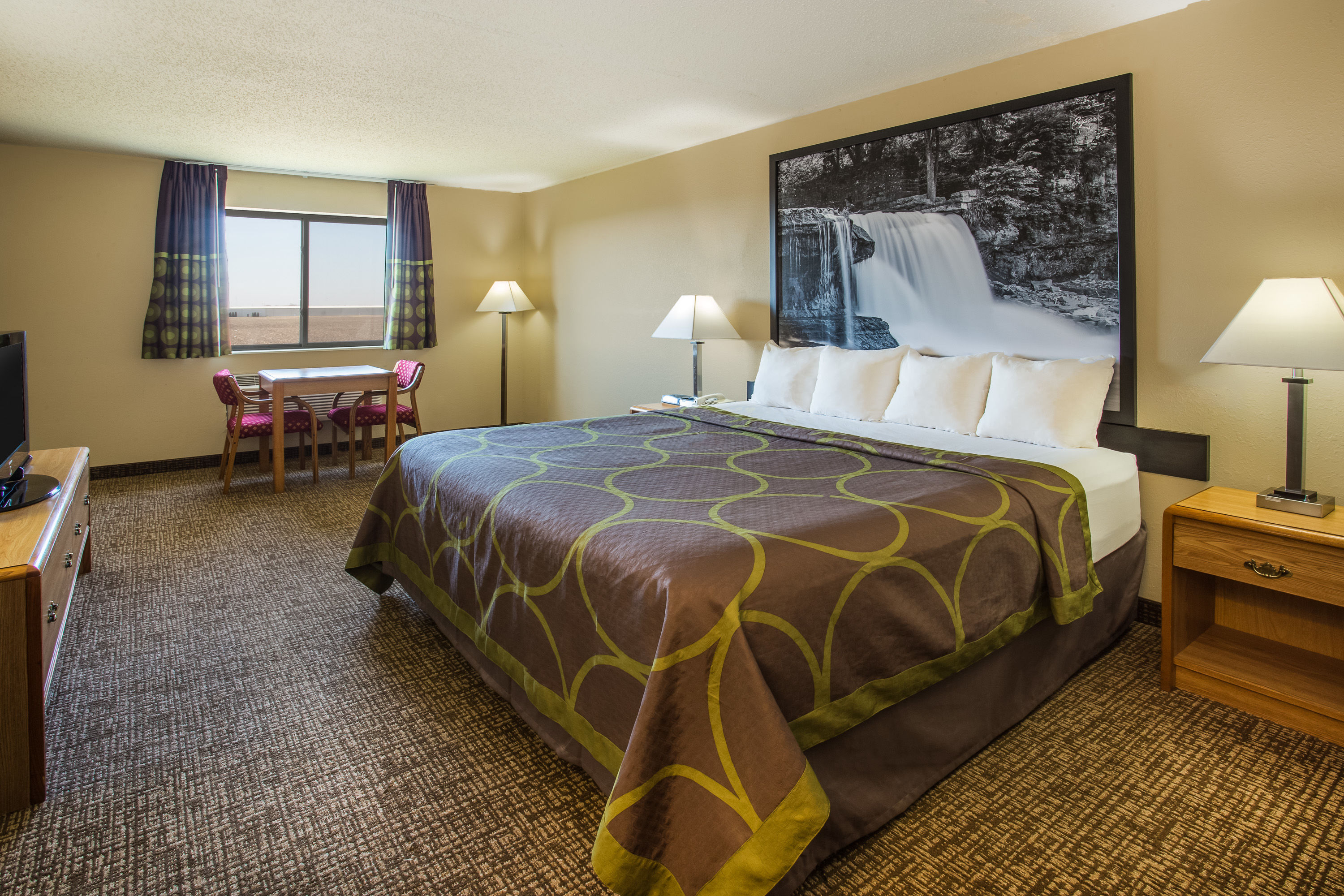 Guest room at the Super 8 by Wyndham Remington in Remington, Indiana