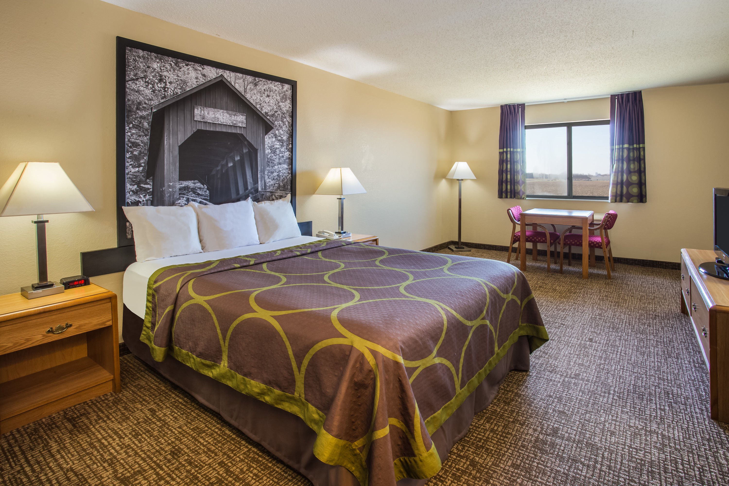 Guest room at the Super 8 by Wyndham Remington in Remington, Indiana