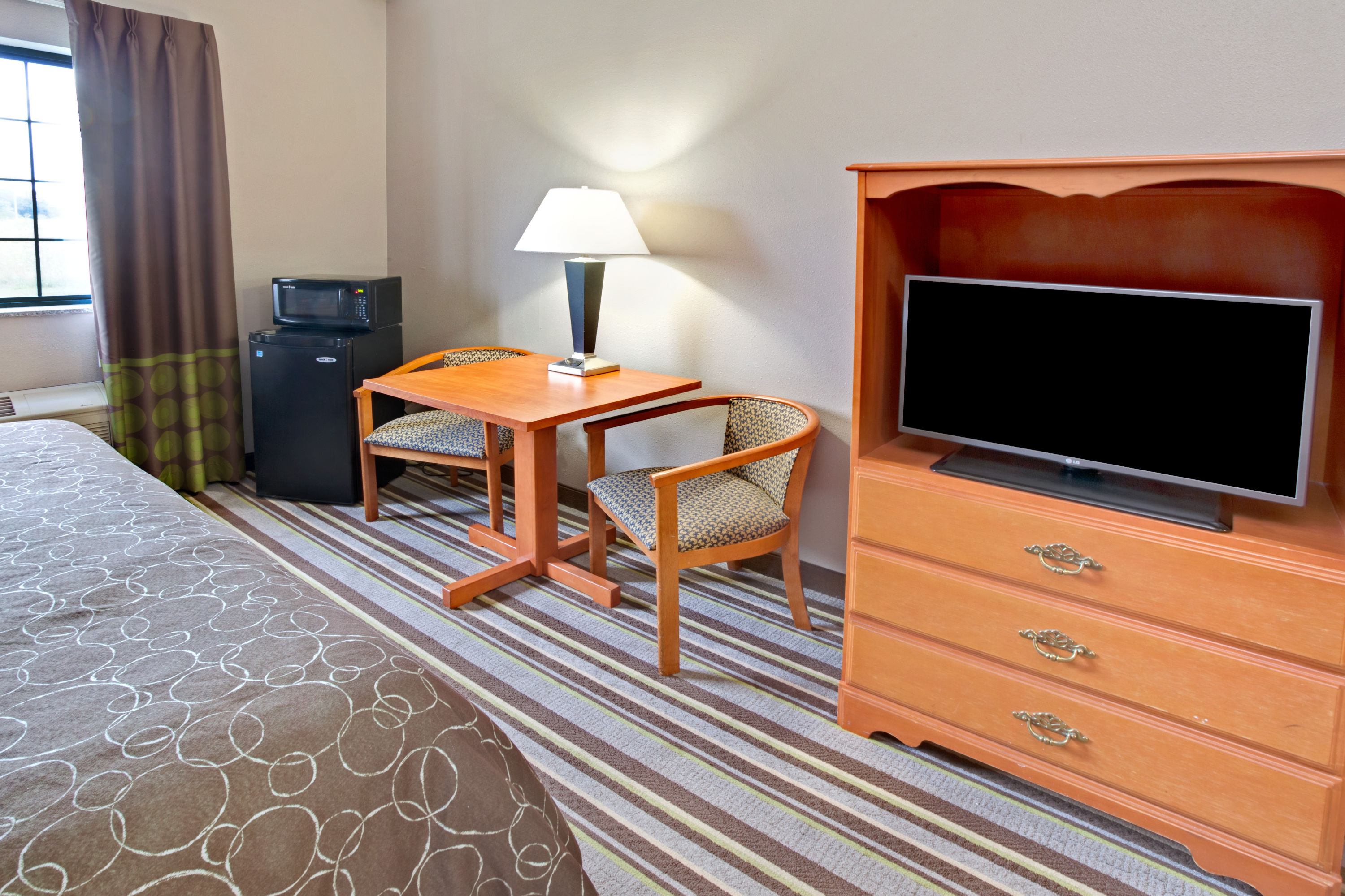 Guest room at the Super 8 by Wyndham South Bend in South Bend, Indiana