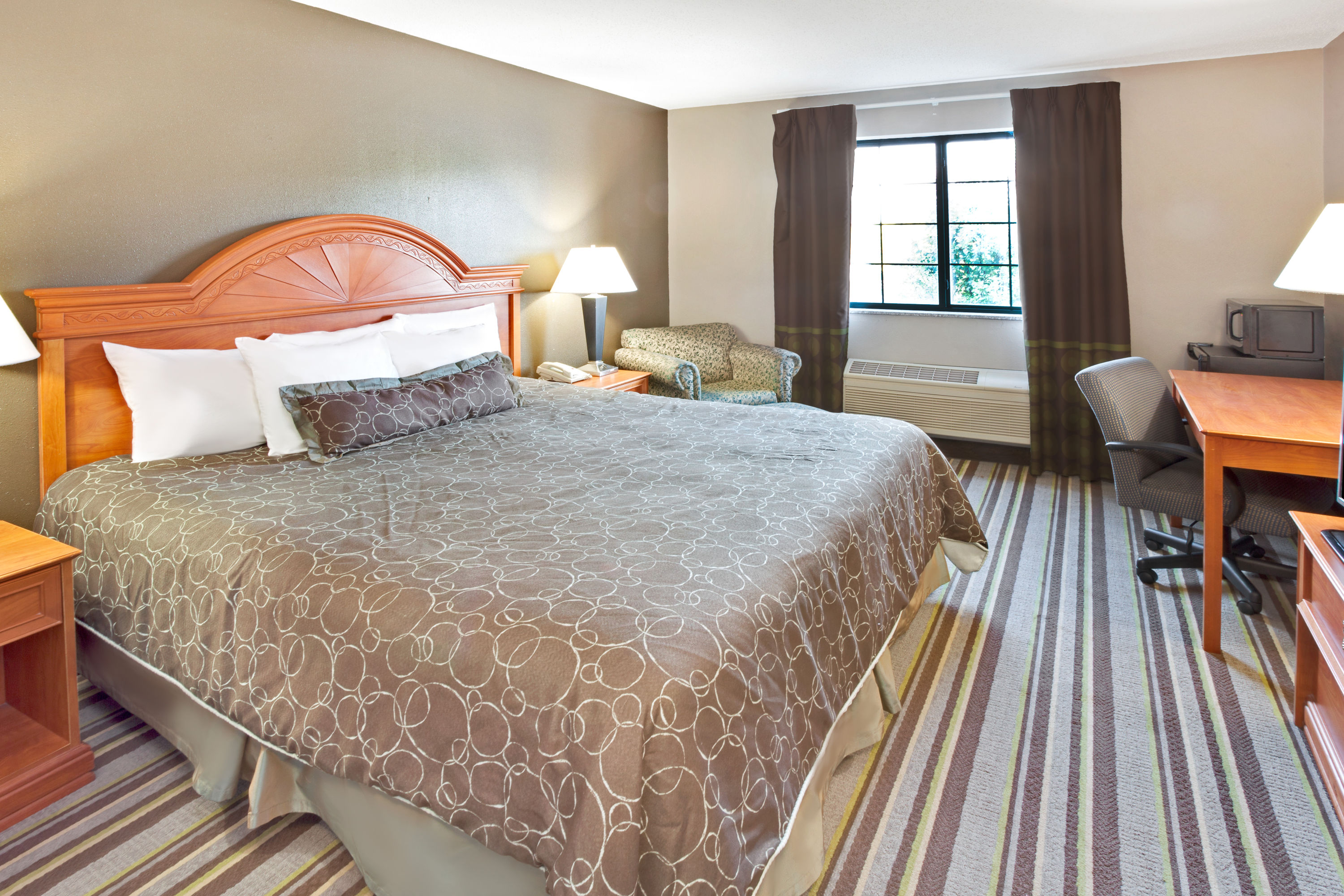 Guest room at the Super 8 by Wyndham South Bend in South Bend, Indiana