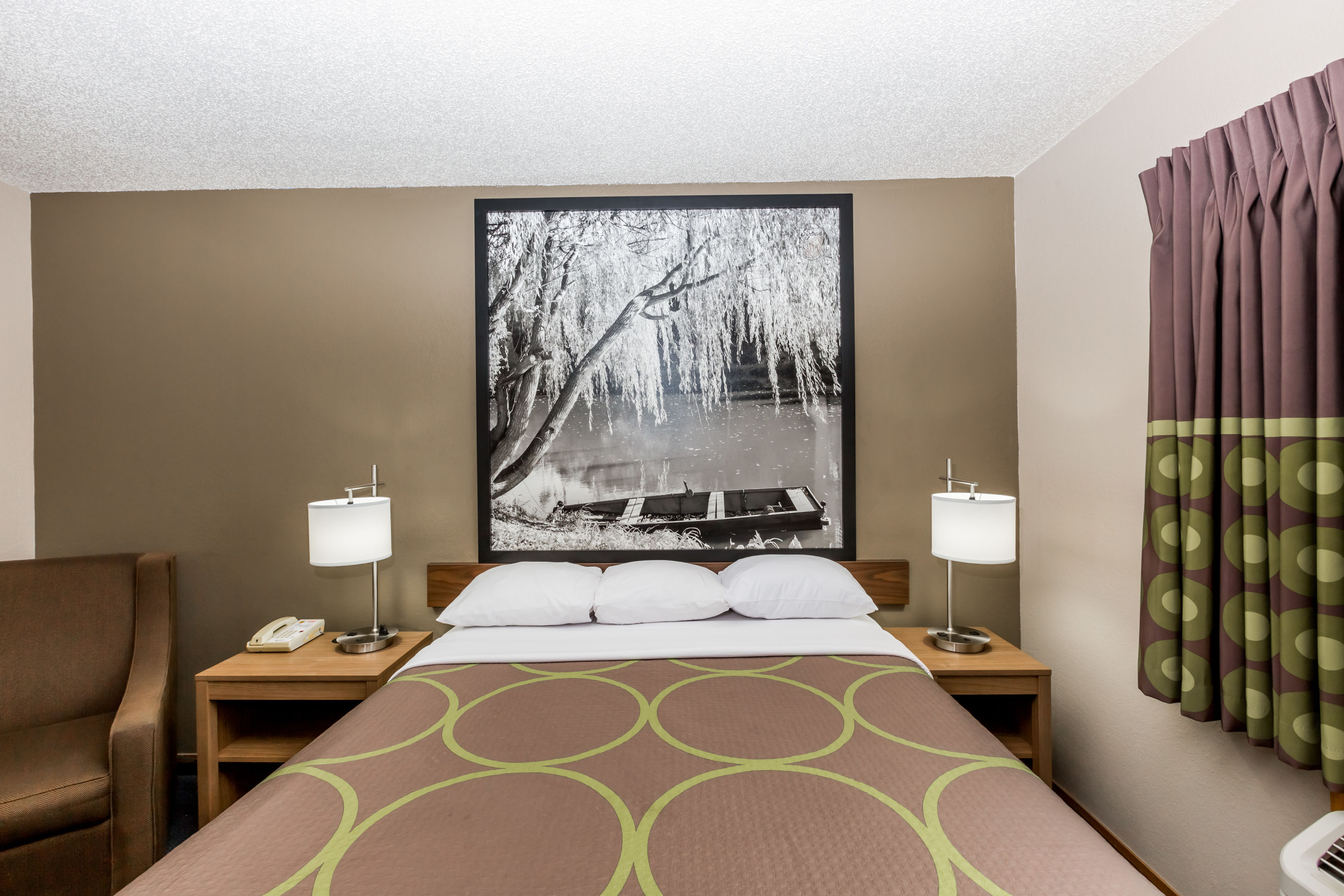 Guest room at the Super 8 by Wyndham Hays KS in Hays, Kansas