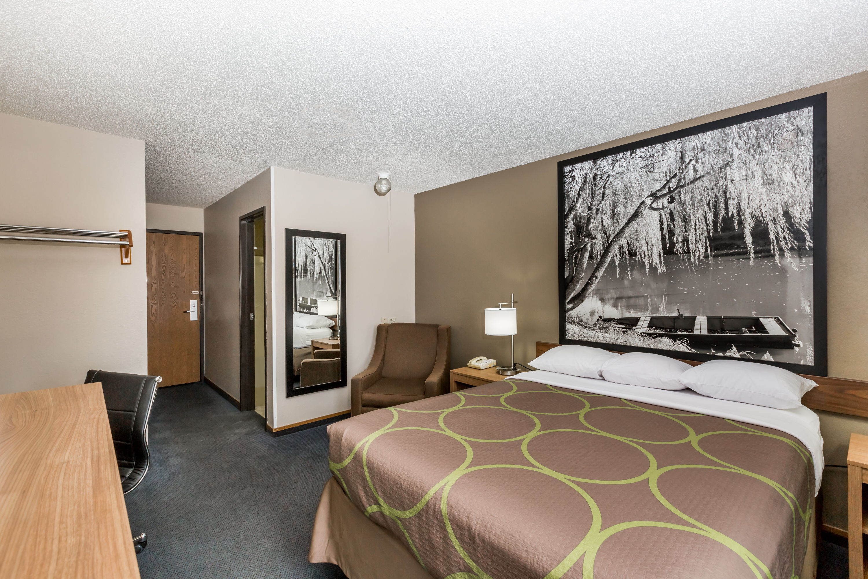 Guest room at the Super 8 by Wyndham Hays KS in Hays, Kansas