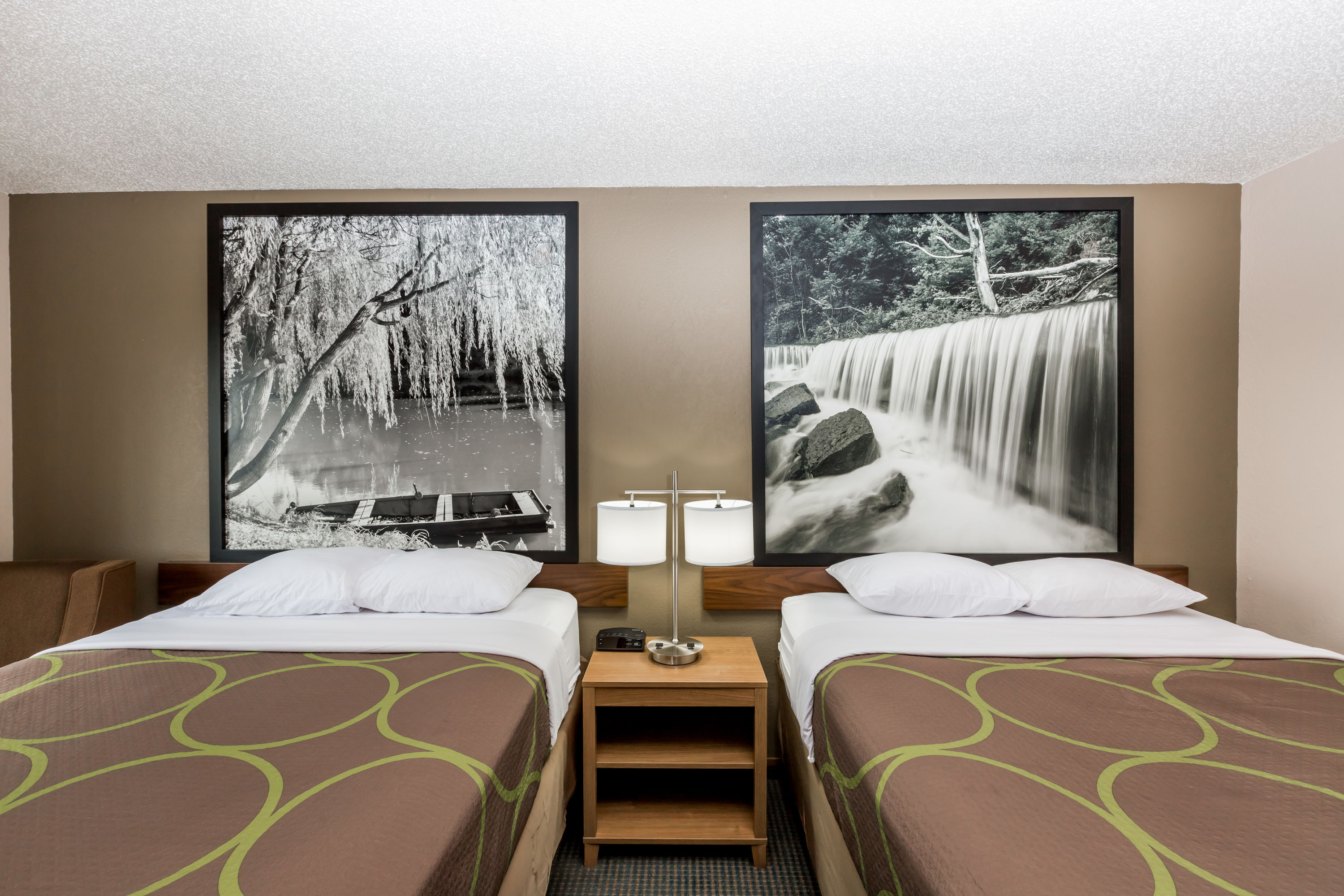 Guest room at the Super 8 by Wyndham Hays KS in Hays, Kansas