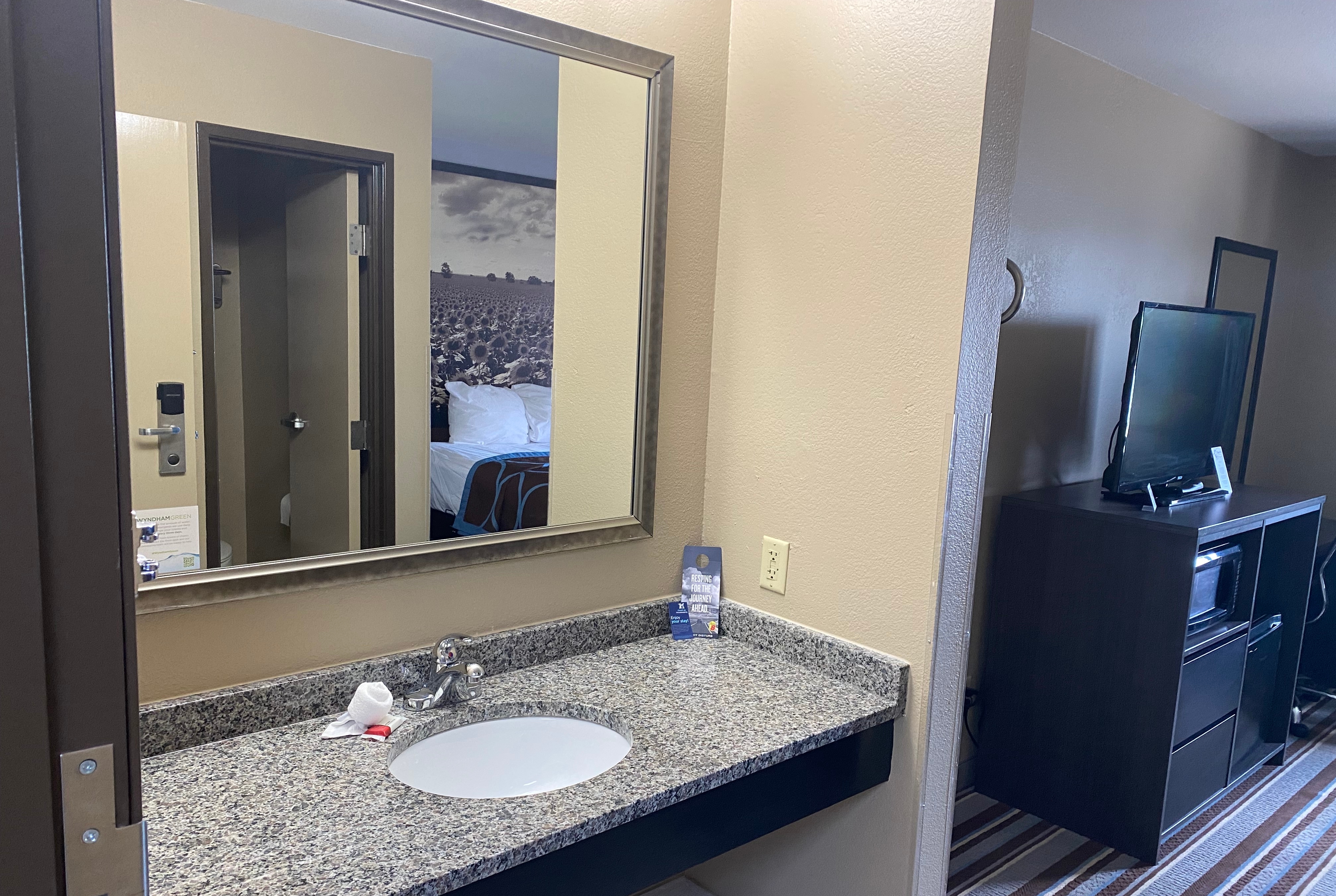 Guest room bath at the Super 8 by Wyndham Independence KS in Independence, Kansas