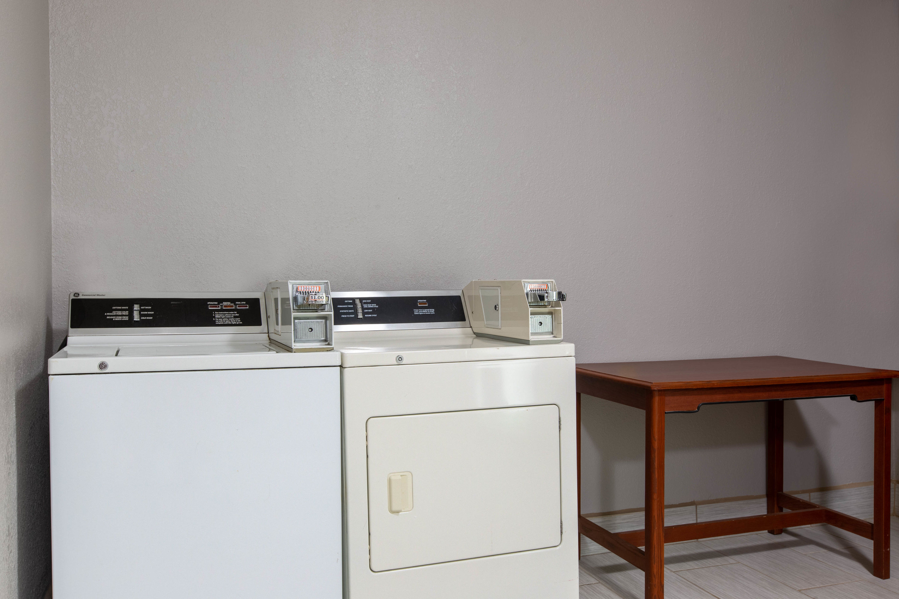 Laundry facilities at Super 8 by Wyndham Ottawa in Ottawa, Kansas