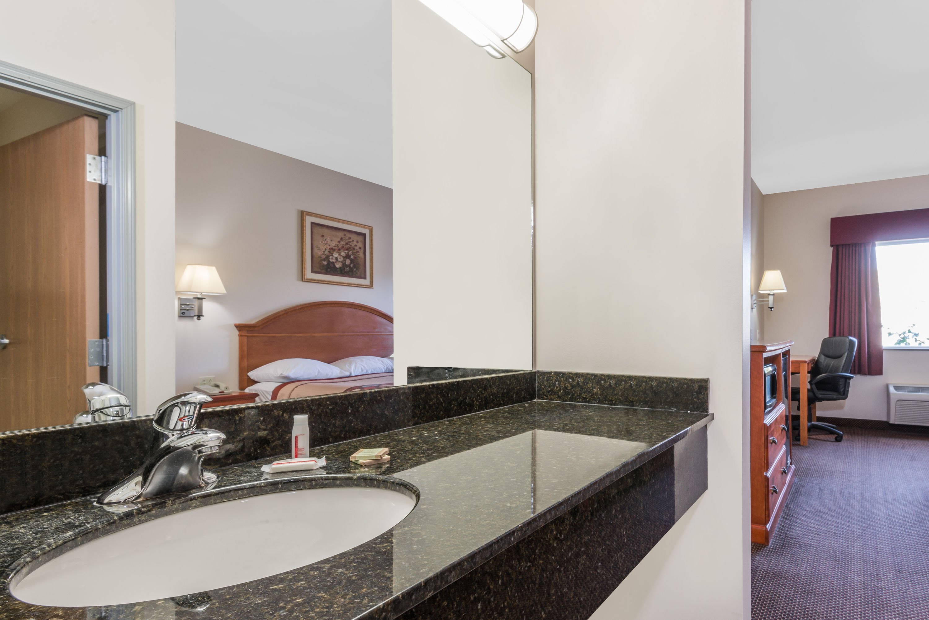 Guest room at the Super 8 by Wyndham Salina in Salina, Kansas